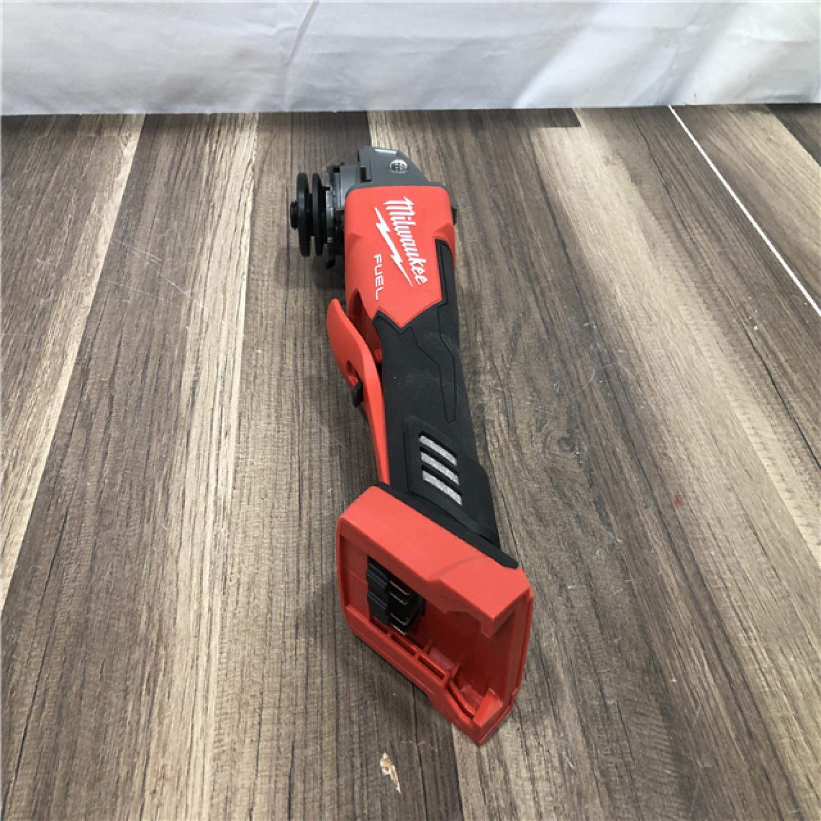 AS-IS Milwaukee FUEL 18V Lithium-Ion Brushless Cordless 4-1/2 in./5 in. Grinder w/Paddle Switch (Tool-Only)