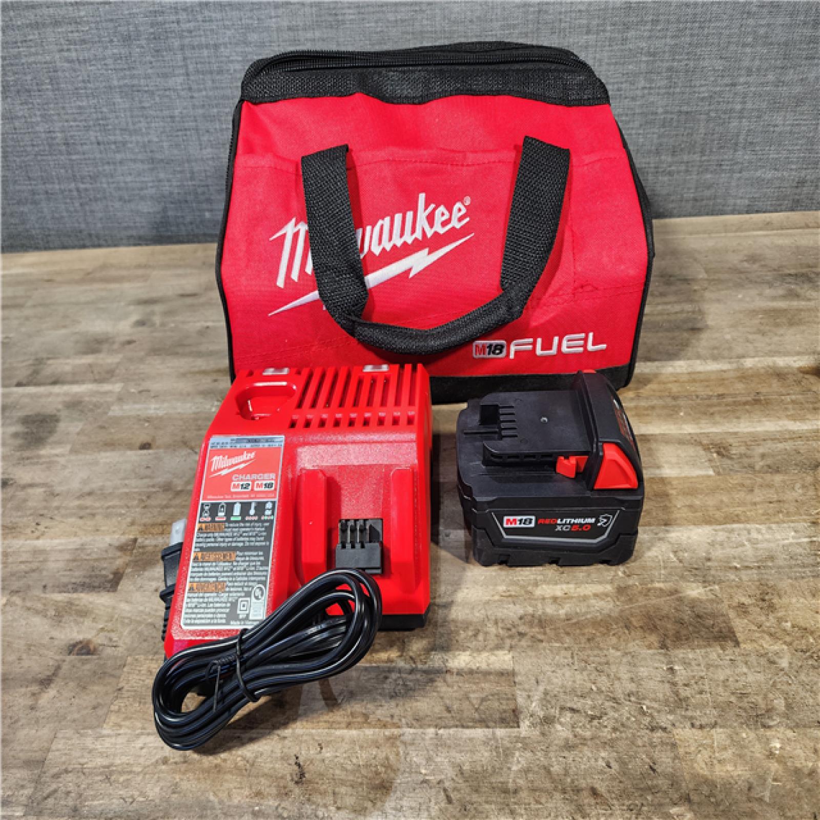 HOUSTON LOCATION - AS-IS Milwaukee M18 1/2 in. Cordless Brushless High Torque Impact Wrench Kit (Battery & Charger)