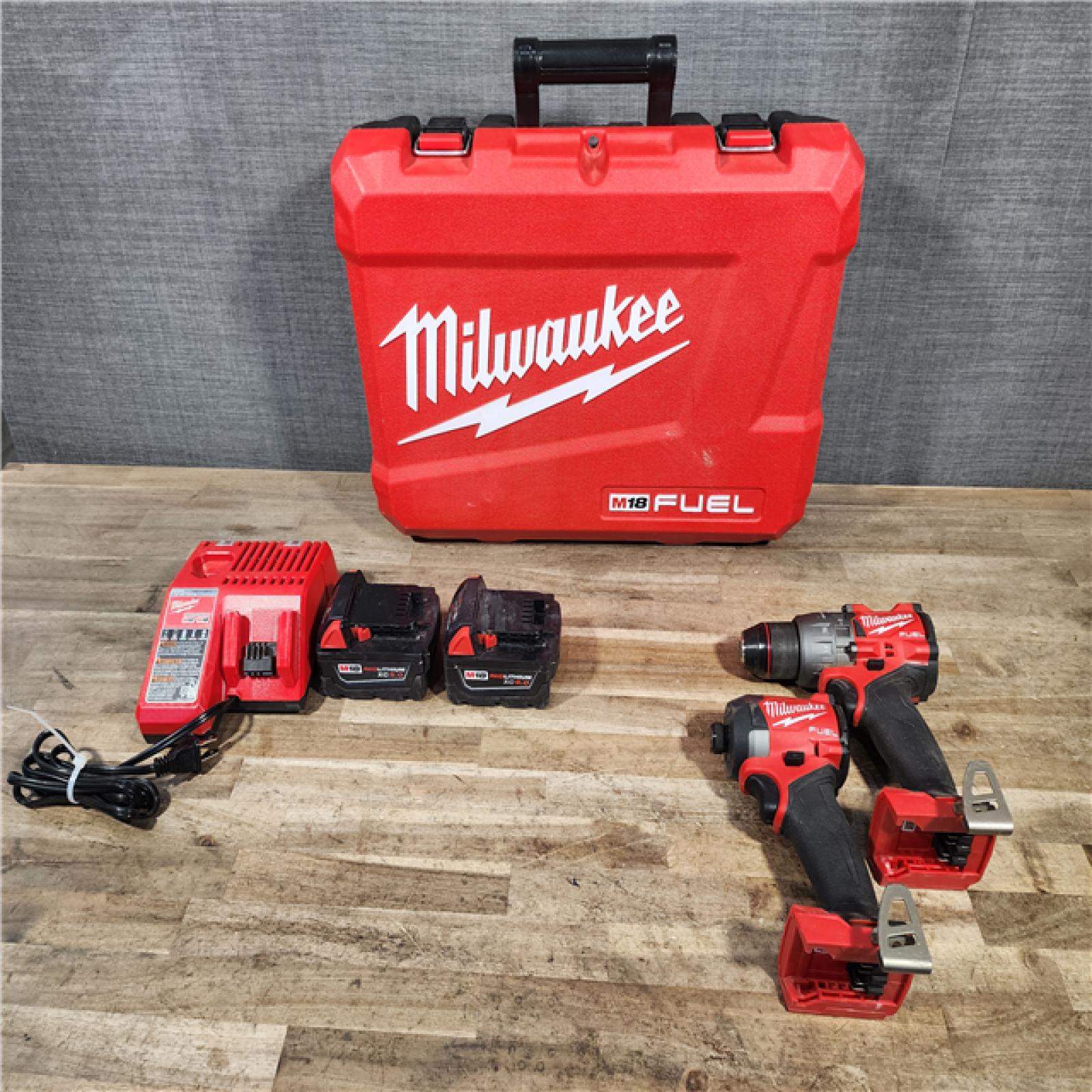 HOUSTON LOCATION - AS-IS Milwaukee FUEL 18V Lithium-Ion Brushless Cordless Hammer Drill and Impact Driver Combo Kit