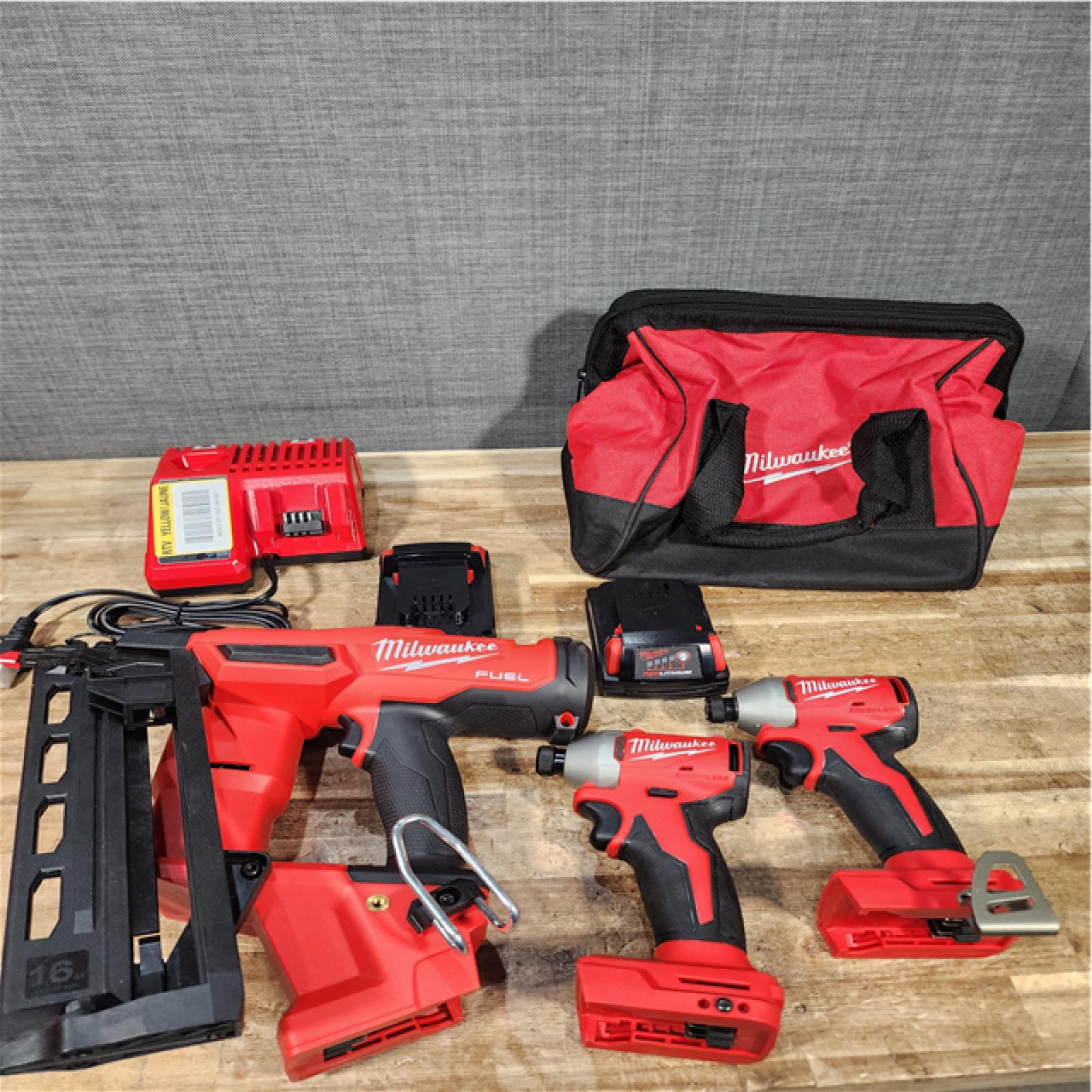 Houston Location AS-IS Milwaukee Drills QTY/2 and Nail Gun and Batteries QTY/2 with Charger