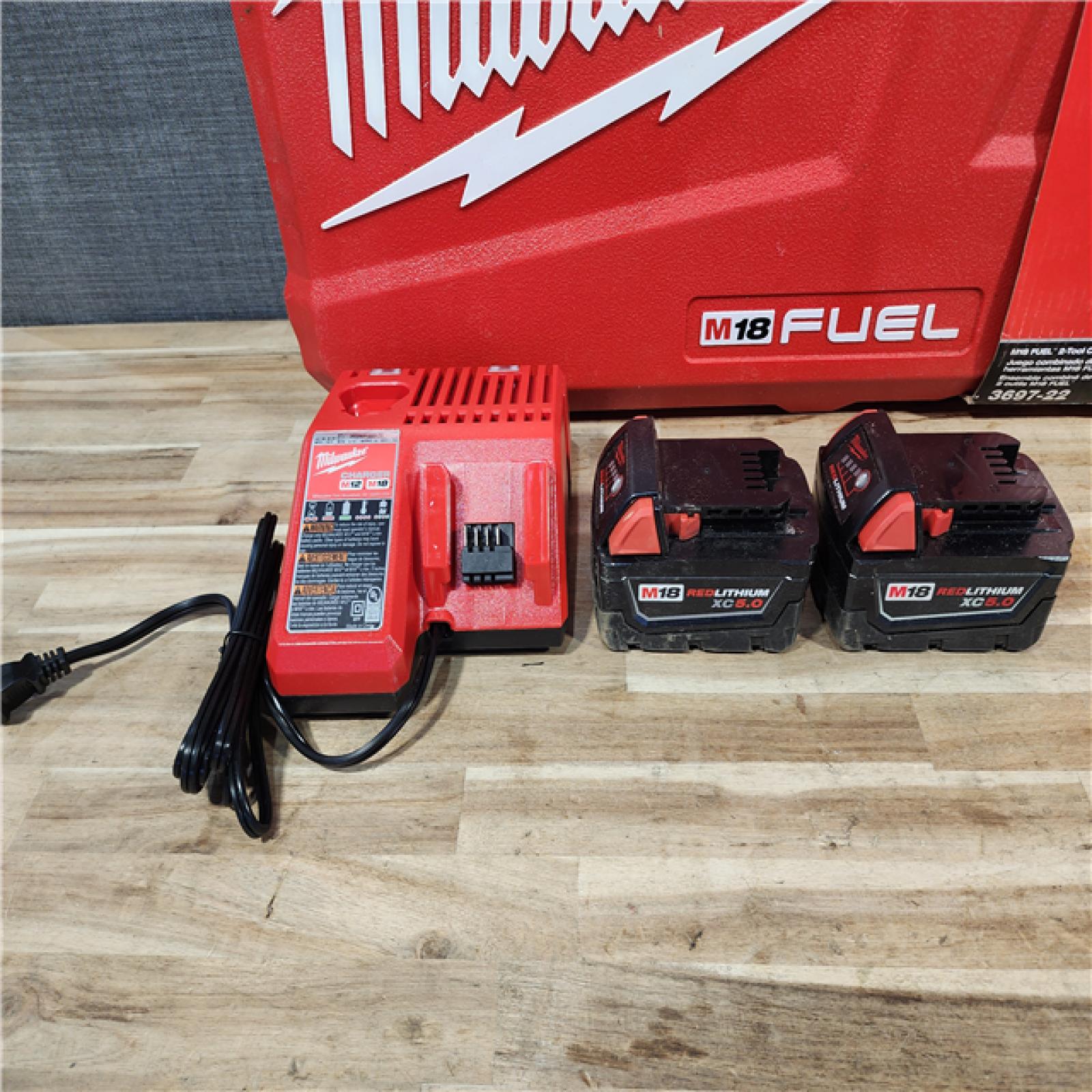 HOUSTON LOCATION - AS-IS Milwaukee FUEL 18V Lithium-Ion Brushless Cordless Hammer Drill and Impact Driver Combo Kit