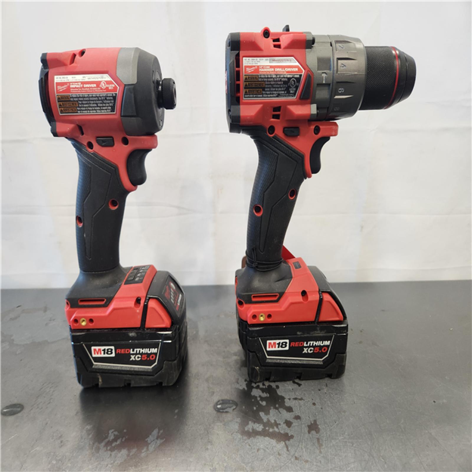 AS-IS- Milwaukee FUEL 18V Lithium-Ion Brushless Cordless Hammer Drill and Impact Driver Combo Kit