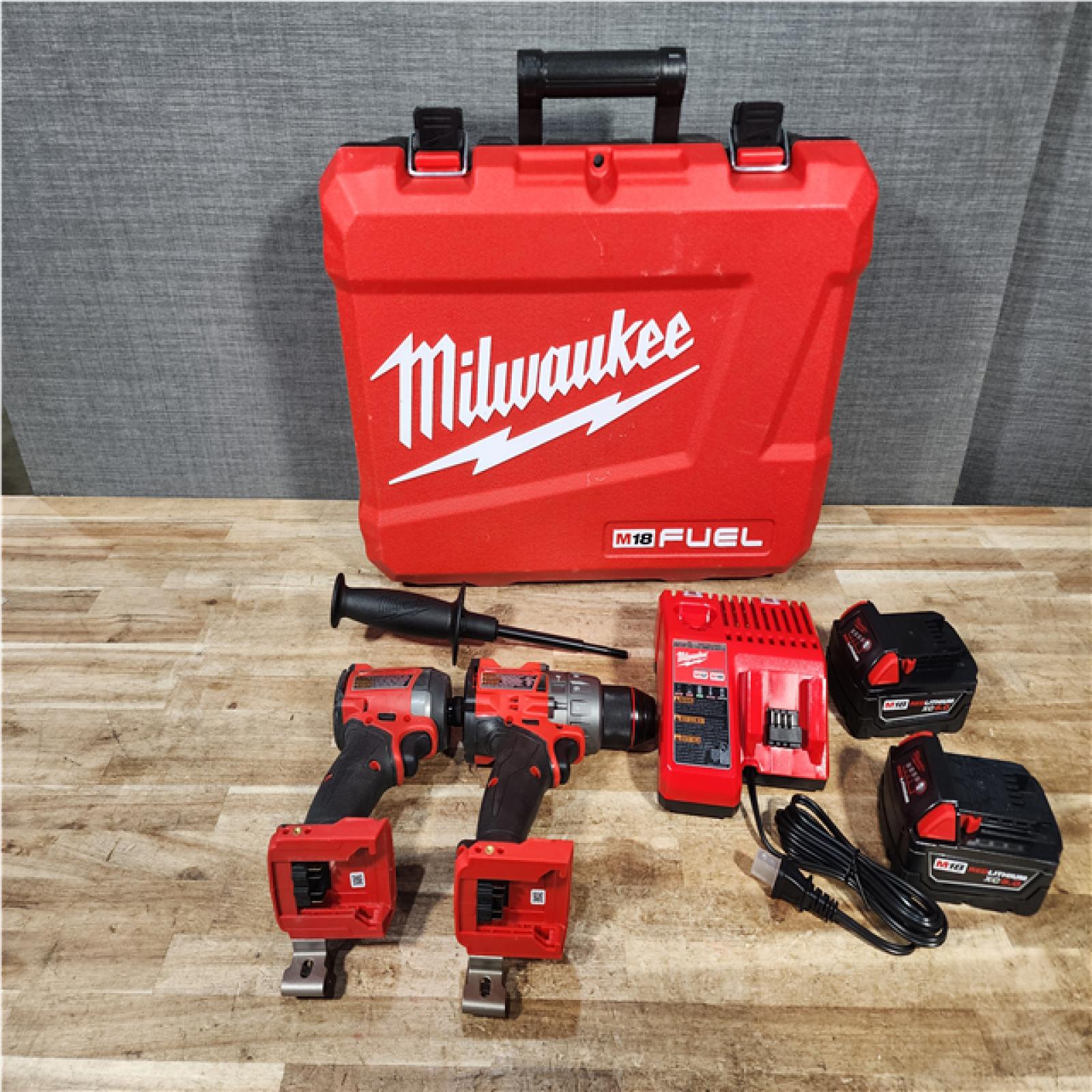 Houston Location AS-IS Milwaukee FUEL 18V Lithium-Ion Brushless Cordless Hammer Drill and Impact Driver Combo Kit