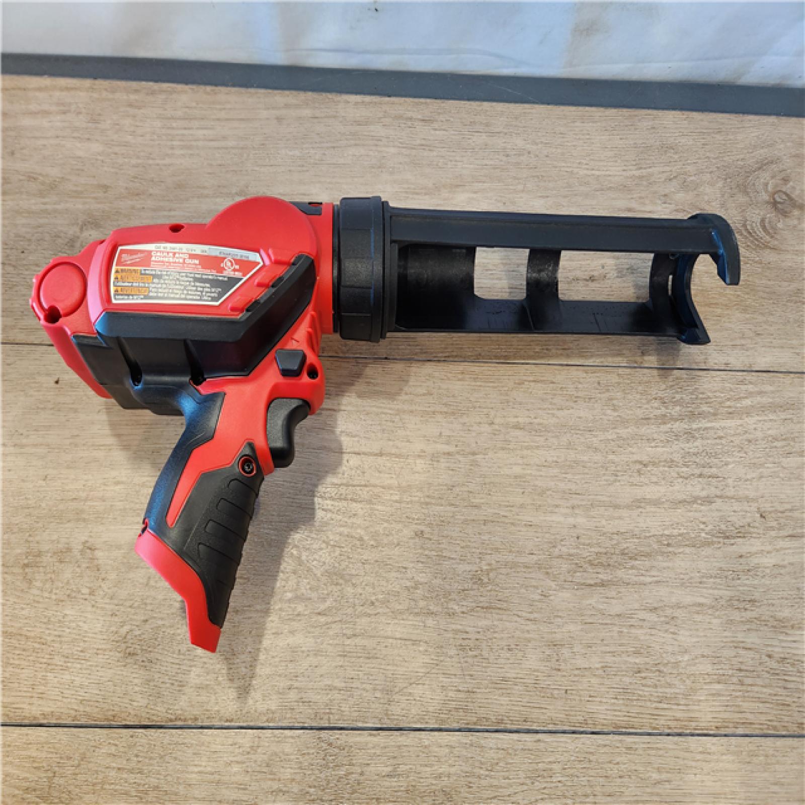 AS-IS- Milwaukee 12V Lithium-Ion Cordless 10 oz. Adhesive and Caulk Gun (Tool-Only)