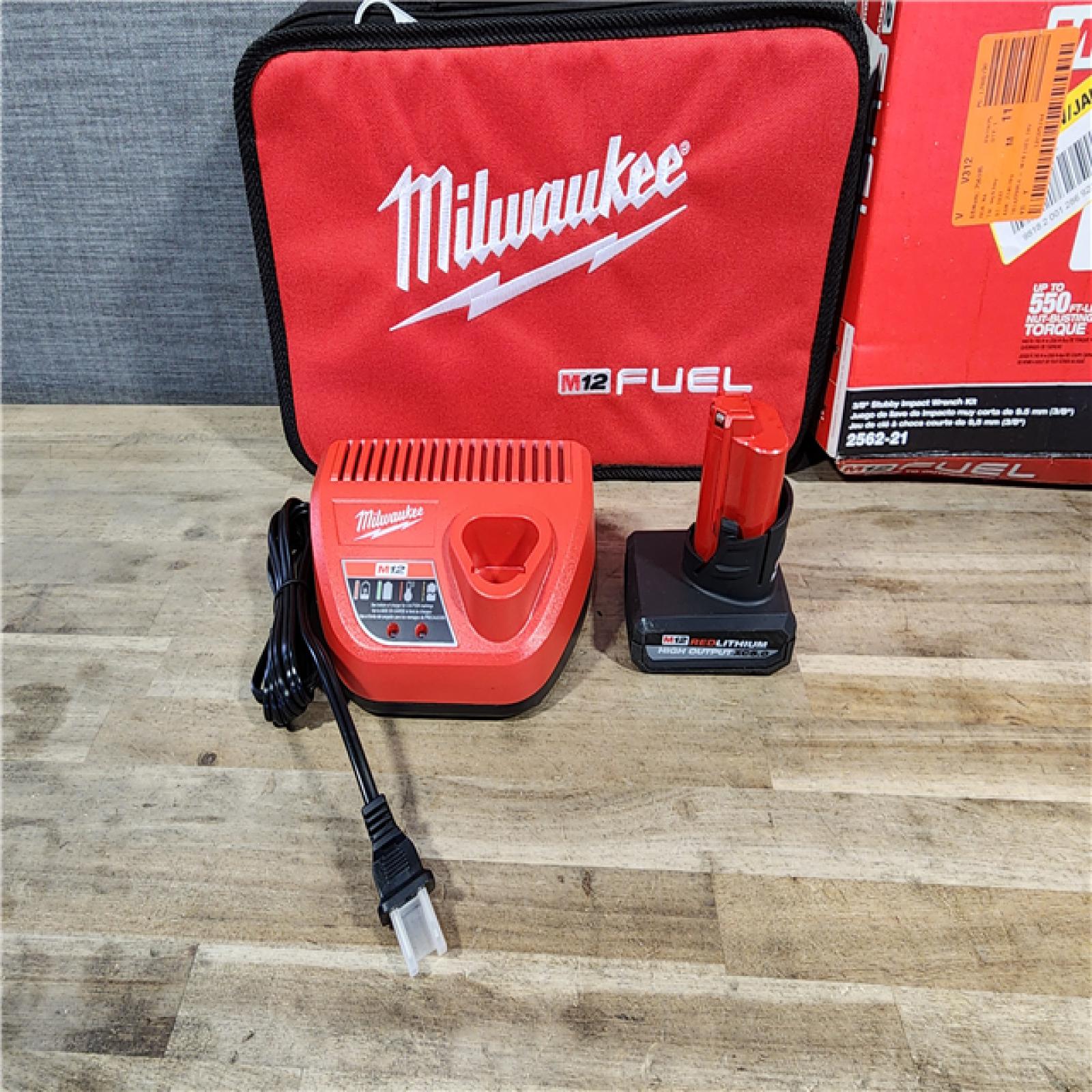 HOUSTON LOCATION - AS-IS (APPEARS LIKE NEW) Milwaukee M12 FUEL 12V Li-Ion Brushless Cordless Stubby 3/8 in. Impact Wrench Kit W/(1) 5.0 Ah High Output Battery