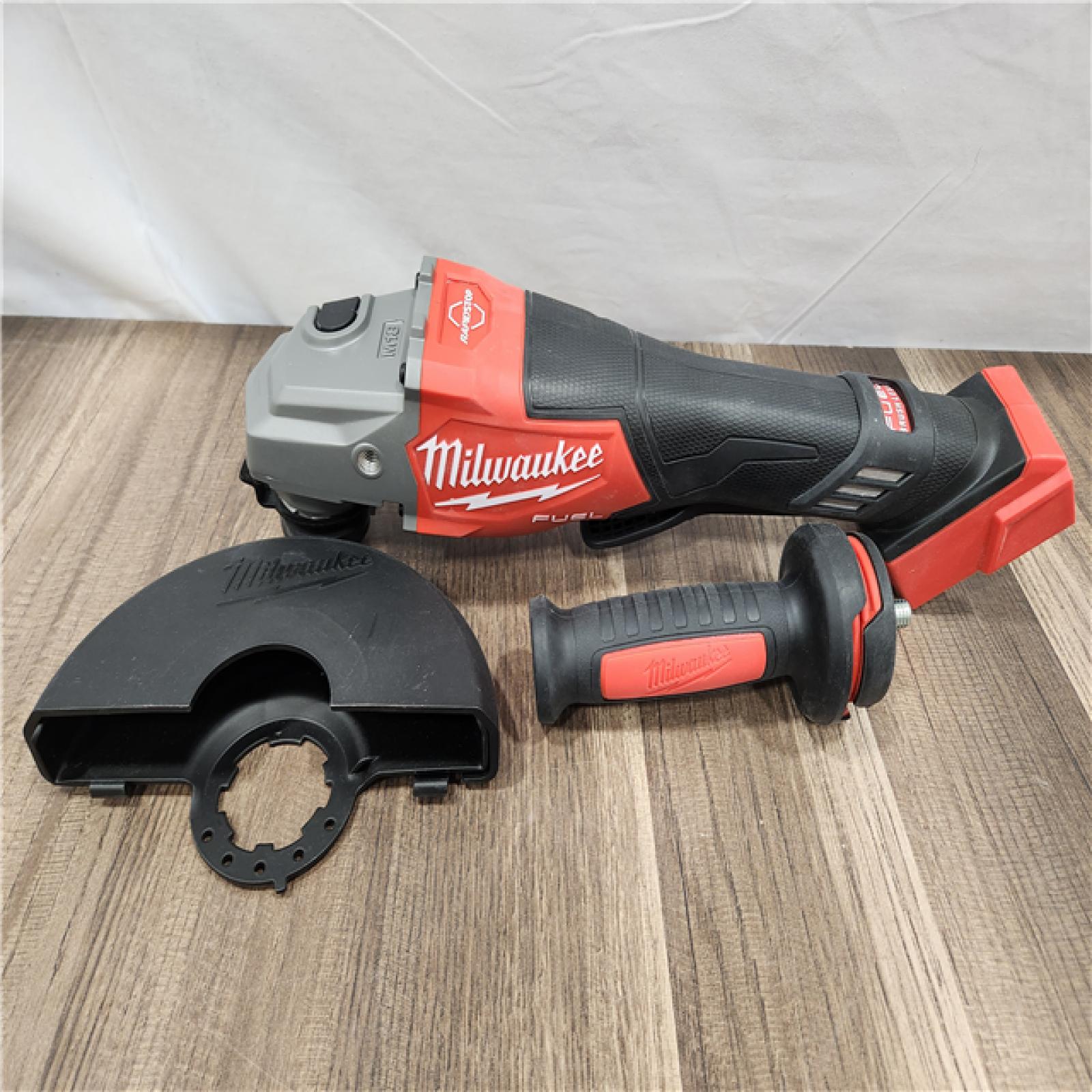 AS-IS- Milwaukee M18 FUEL 4-1/2-6 Cordless Braking Grinder  Paddle Switch (Tool-Only)