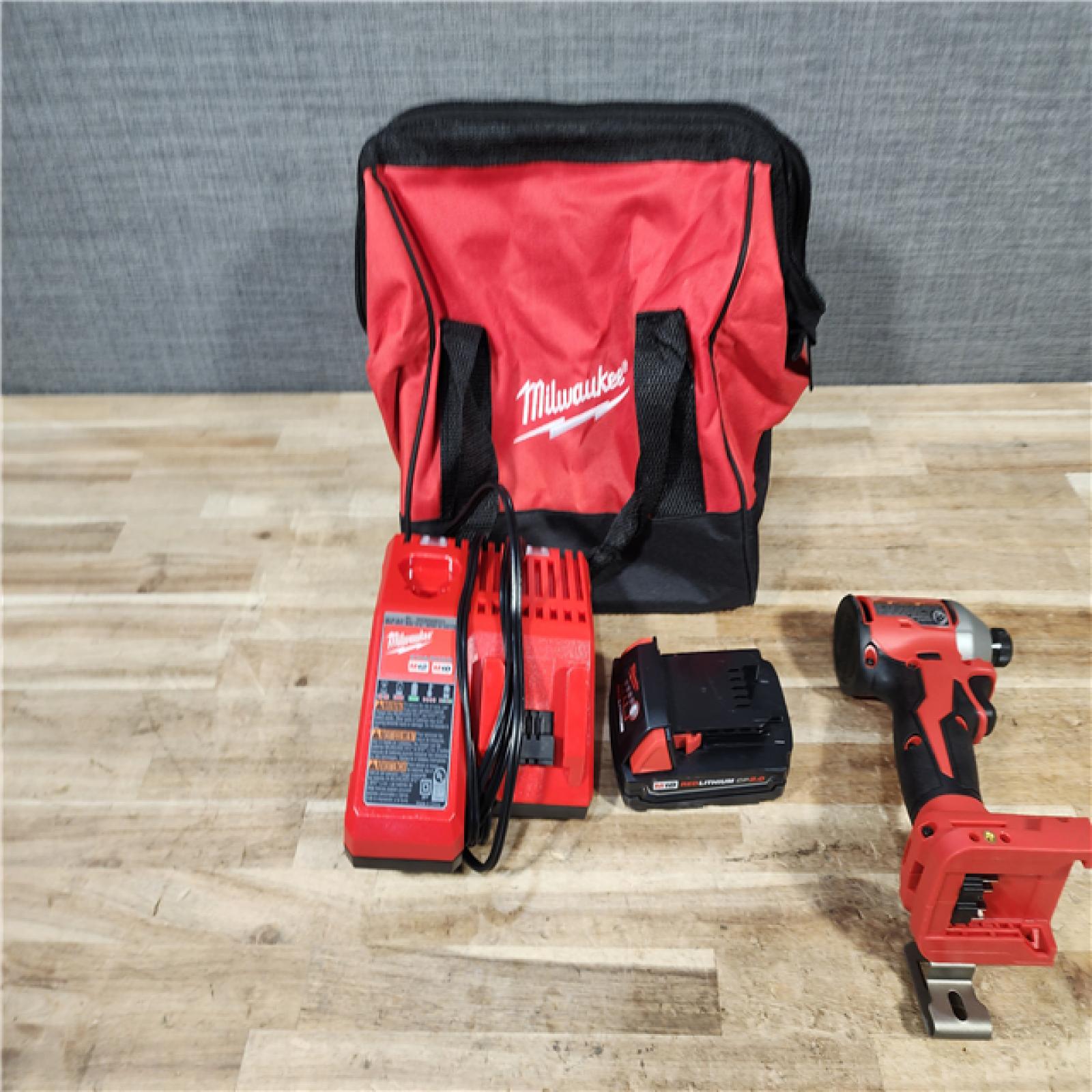 HOUSTON LOCATION - AS - IS Milwaukee 18-Volt Lithium-Ion Compact Brushless Cordless 1/4 in. Impact Driver Kit