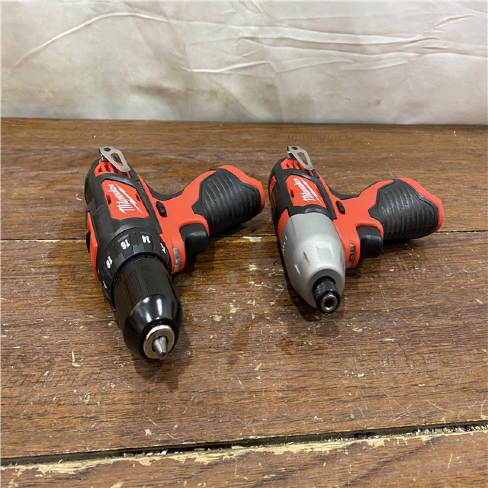 AS-IS  Milwaukee M12 12V Lithium-Ion Cordless Drill Driver/Impact Driver Combo Kit with Two 1.5Ah Batteries, Charger and Bag (2-Tool)