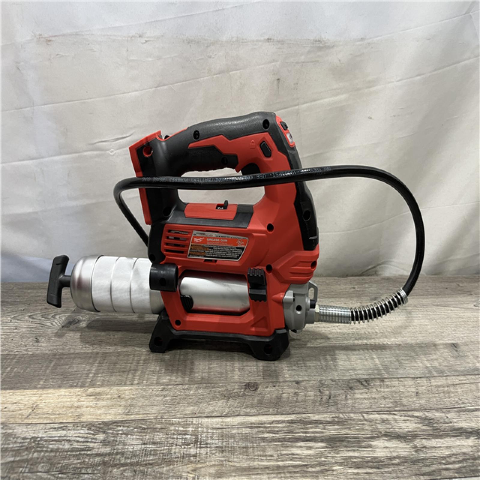 AS-IS Milwaukee 18V Lithium-Ion Cordless Grease Gun 2-Speed (Tool-Only)