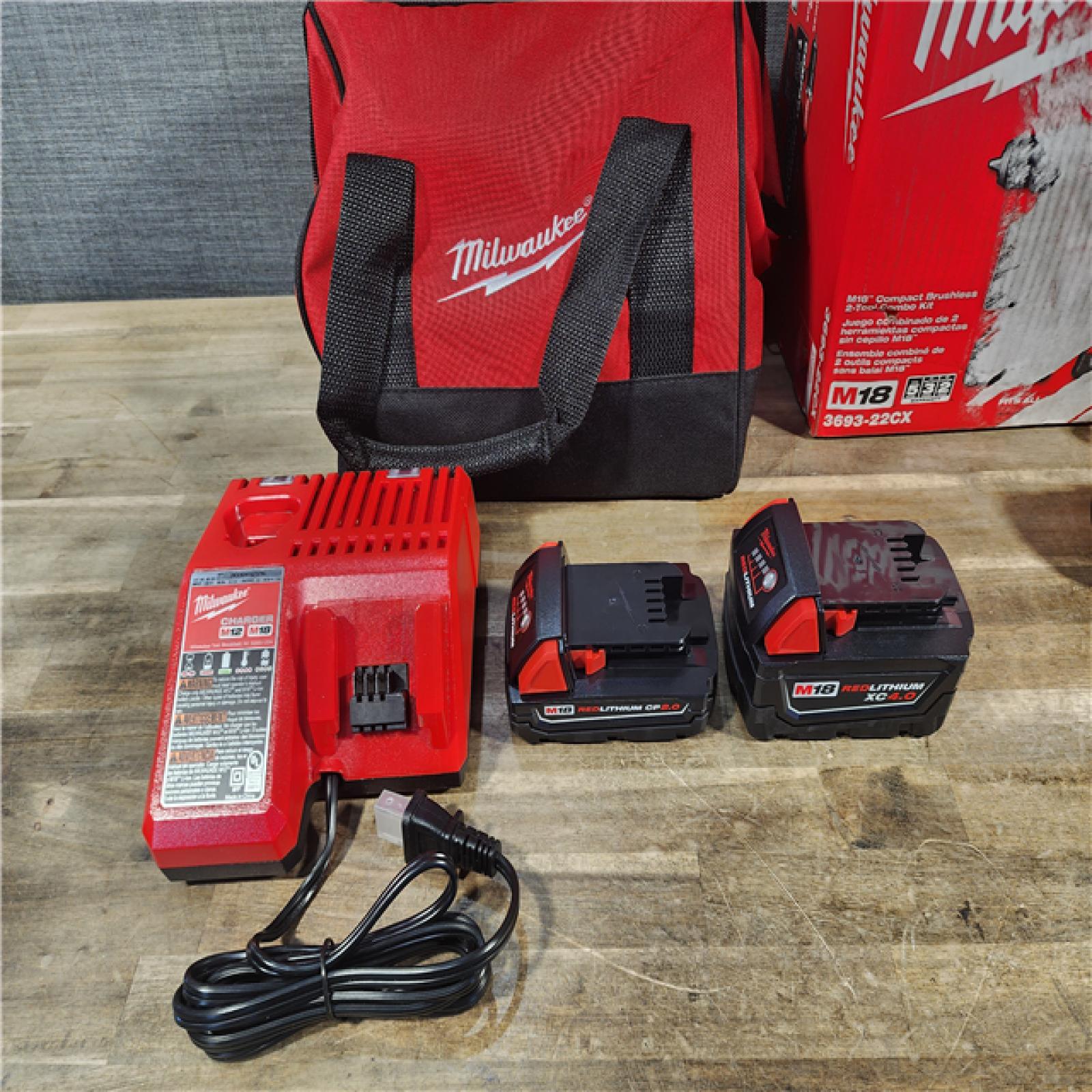 HOUSTON LOCATION - AS-IS (APPEARS LIKE NEW) M18 18-Volt Lithium-Ion Brushless Cordless Compact Hammer Drill/Impact Combo Kit (2-Tool) with (2) Batteries, Bag