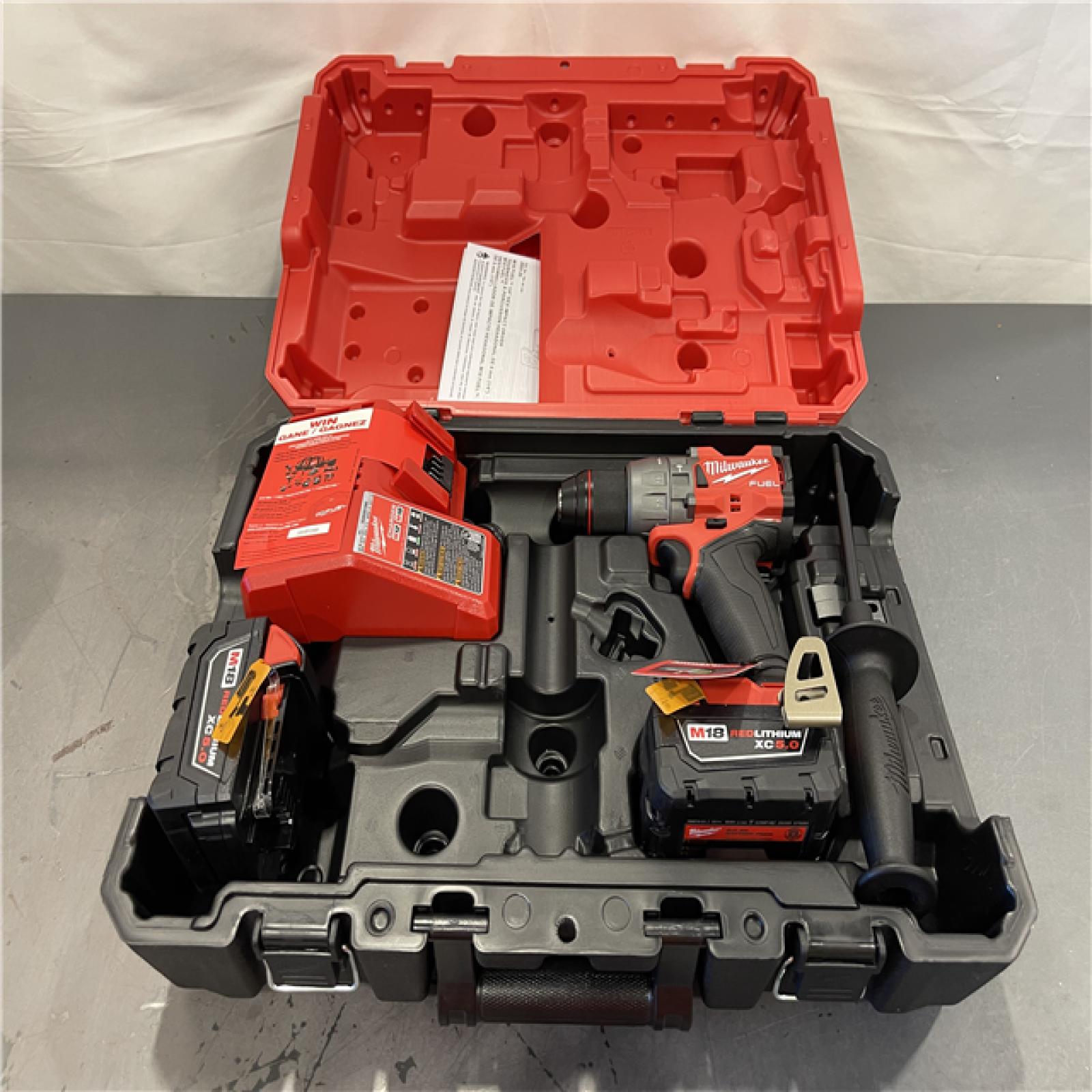AS-IS - Milwaukee M18 FUEL 18V Lithium-Ion Brushless Cordless 1/2 in. Hammer Drill Driver Kit