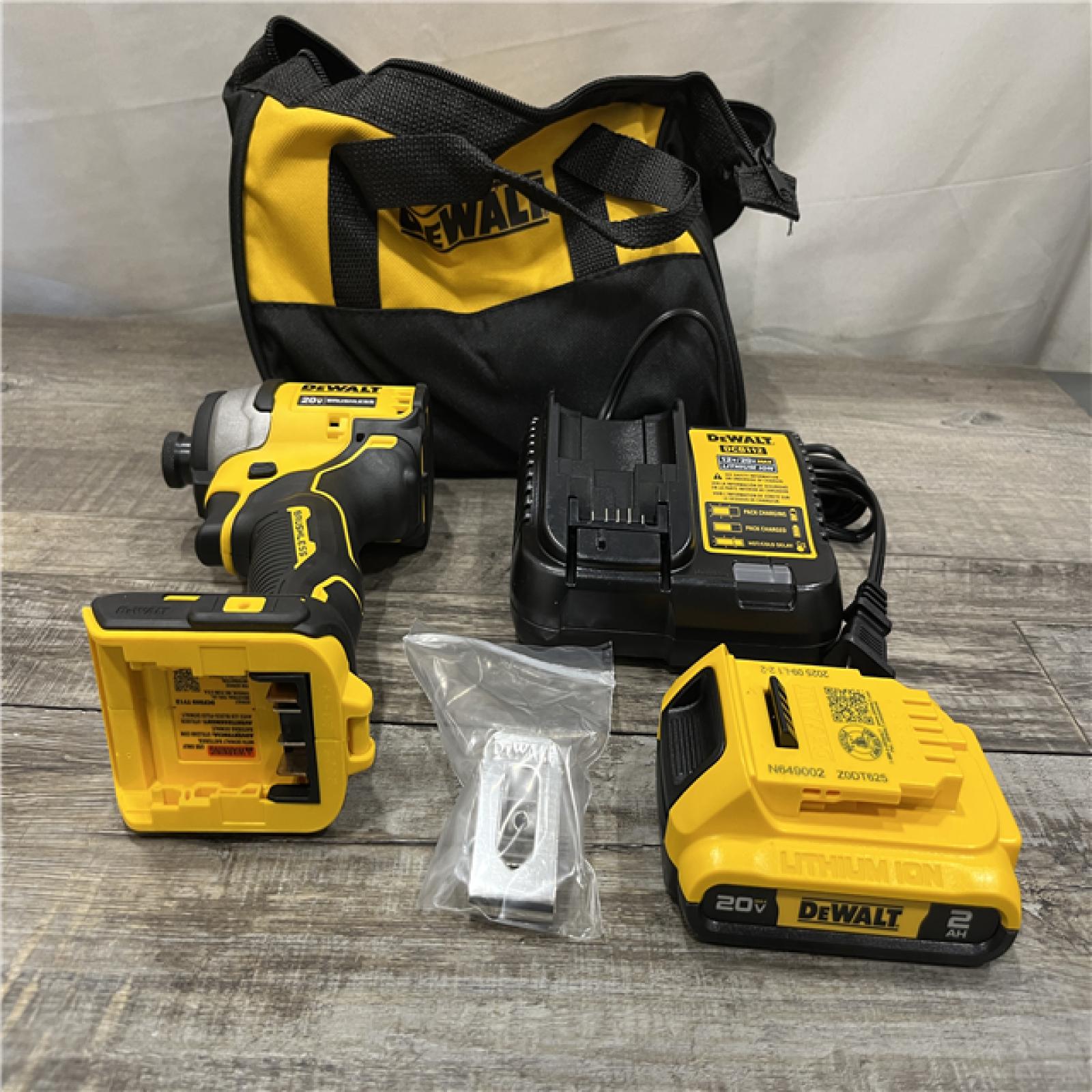 AS-IS DEWALT Atomic 20V Max Lithium-Ion Brushless Cordless Compact 1/4 in. Impact Driver Kit