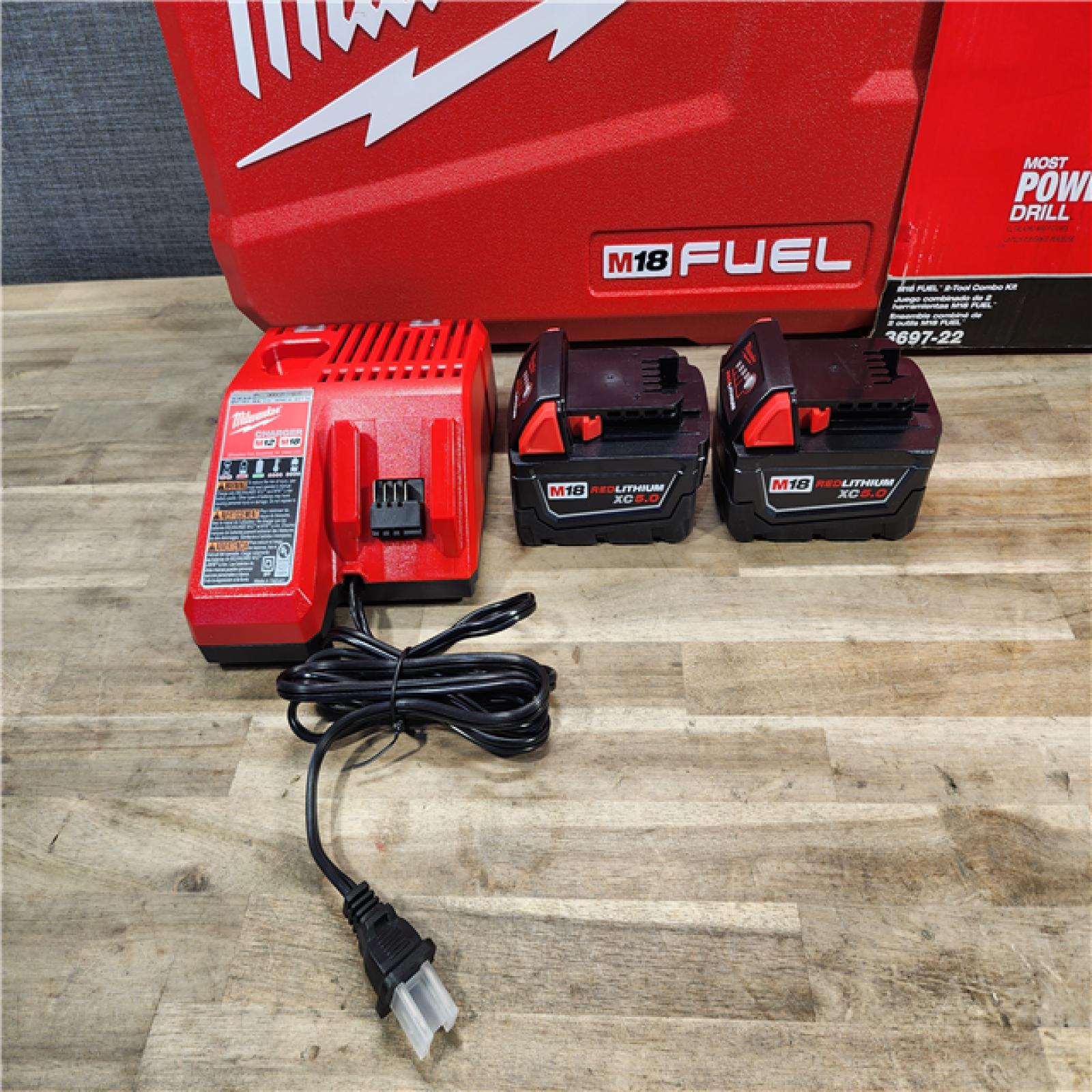 HOUSTON LOCATION - AS-IS (APPEARS LIKE NEW) MILWAUKEE FUEL 18V Lithium-Ion Brushless Cordless Hammer Drill and Impact Driver Combo Kit (2-Tool) with 2 Batteries
