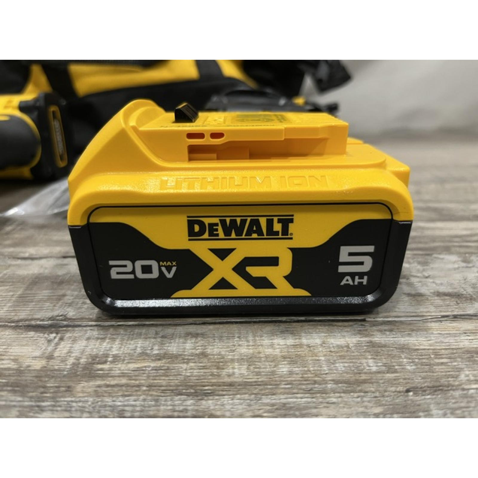 AS-IS DEWALT ATOMIC 20V MAX Lithium-Ion Cordless 1/4 in. Brushless Impact Driver Kit