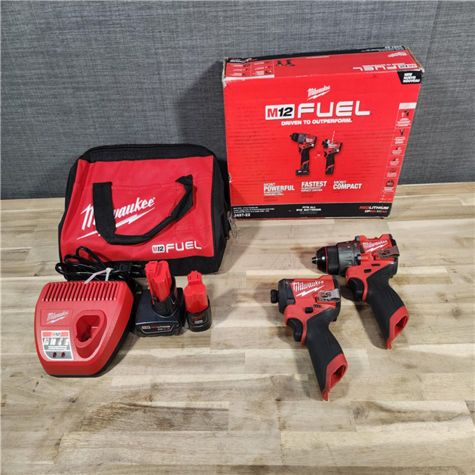HOUSTON LOCATION - AS-IS Milwaukee 3497-22 12V Brushless Hammer Drill and Impact Driver Combo Kit