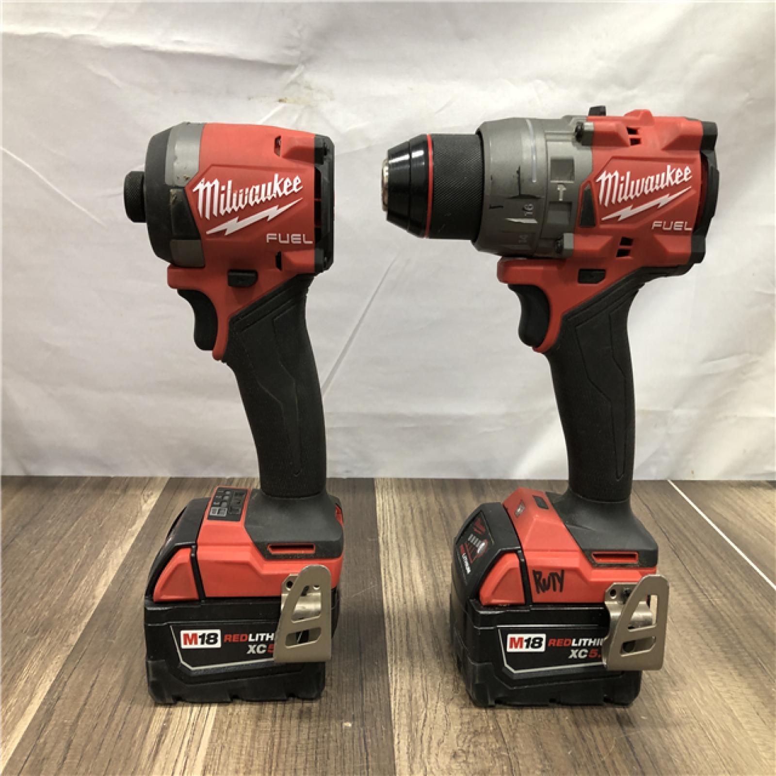 AS-IS Milwaukee FUEL 18V Lithium-Ion Brushless Cordless Hammer Drill and Impact Driver Combo Kit