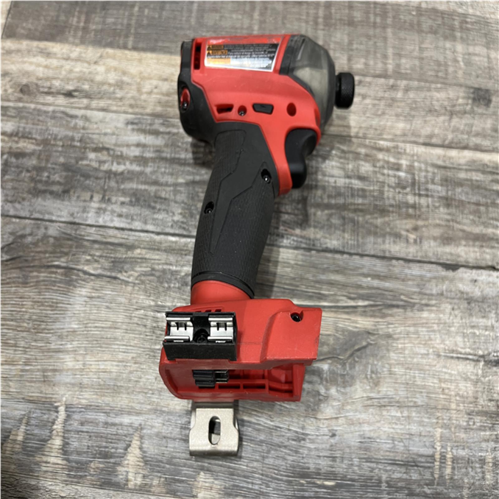 AS-IS Milwaukee FUEL SURGE 18-Volt Lithium-Ion Brushless Cordless 1/4 in. Hex Impact Driver Compact Kit