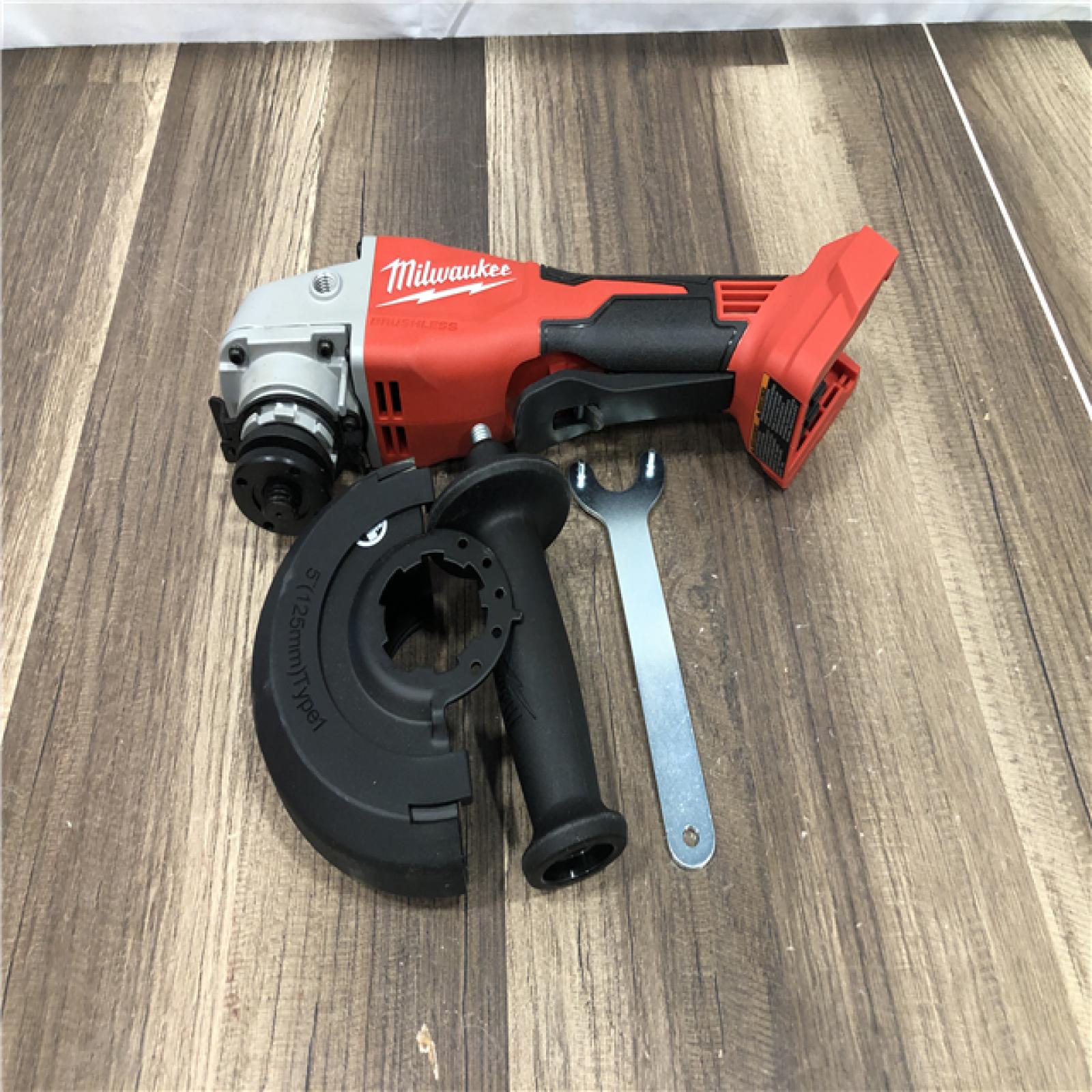 AS-IS Milwaukee 18V Lithium-Ion Brushless Cordless 4-1/2 in./5 in. Grinder w/Paddle Switch (Tool-Only)