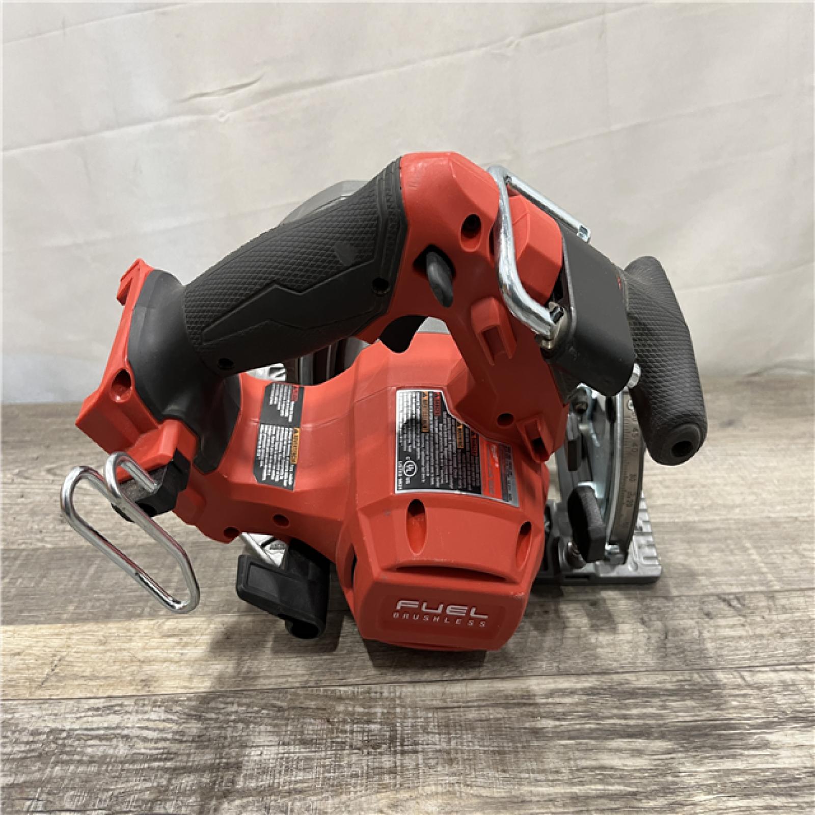 AS-IS Milwaukee FUEL 18V Lithium-Ion Brushless Cordless 6-1/2 in. Circular Saw (Tool-Only)