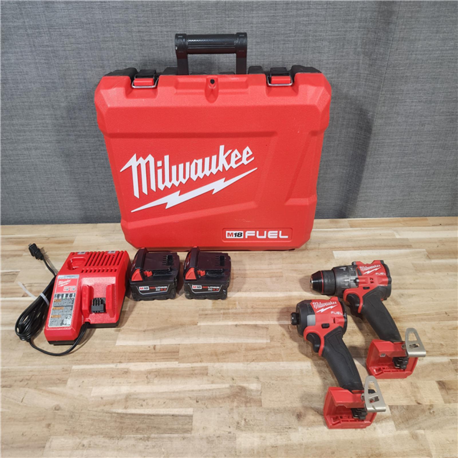 HOUSTON LOCATION - AS-IS Milwaukee  FUEL 18V Lithium-Ion Brushless Cordless Hammer Drill and Impact Driver Combo Kit