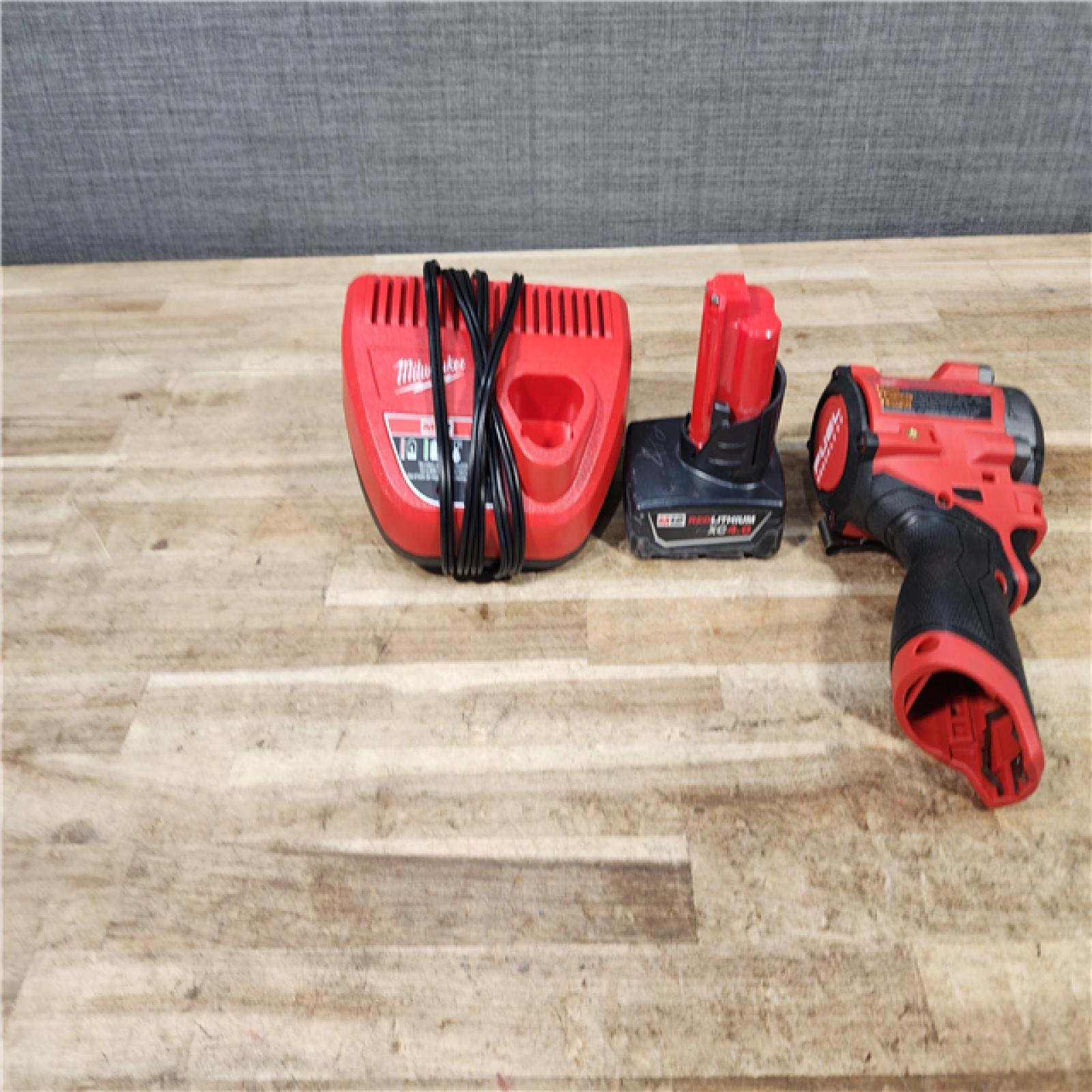 HOUSTON LOCATION - AS - IS Milwaukee FUEL 12V Li-Ion Brushless Cordless Stubby 3/8 in. Impact Wrench Kit