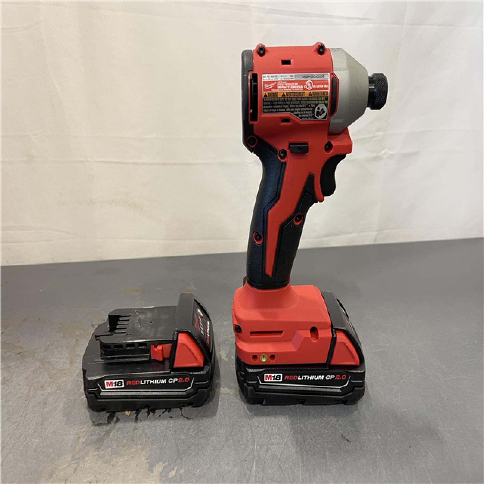 AS-IS - Milwaukee M18 18V Lithium-Ion Brushless Cordless 1/4 in. Impact Driver Kit