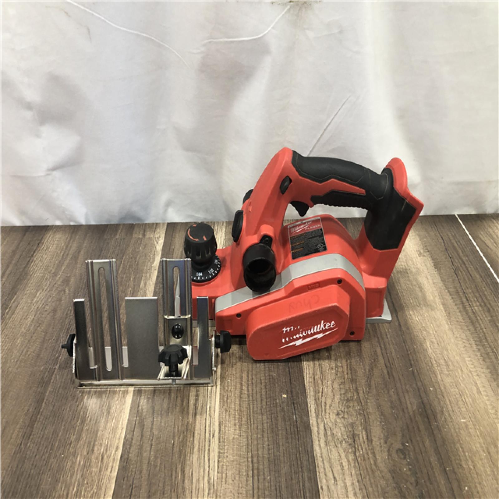 AS-IS Milwaukee M18 18V Lithium-Ion Cordless 3-1/4 in. Planer (Tool-Only)