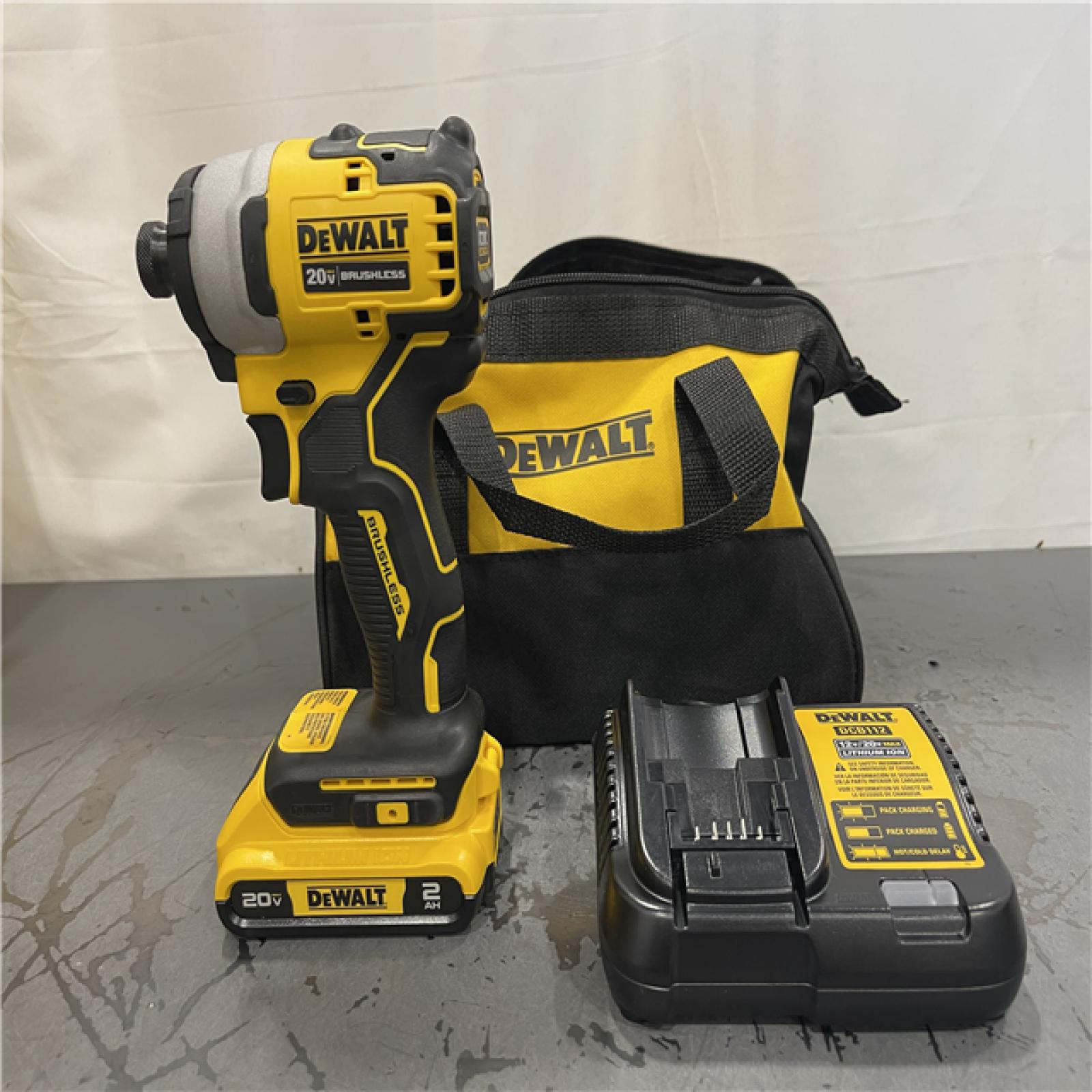 AS-IS- DeWALT ATOMIC 20V MAX Cordless Compact Impact Driver Kit W/ Li-Ion 2ah Battery  1/4  Brushless