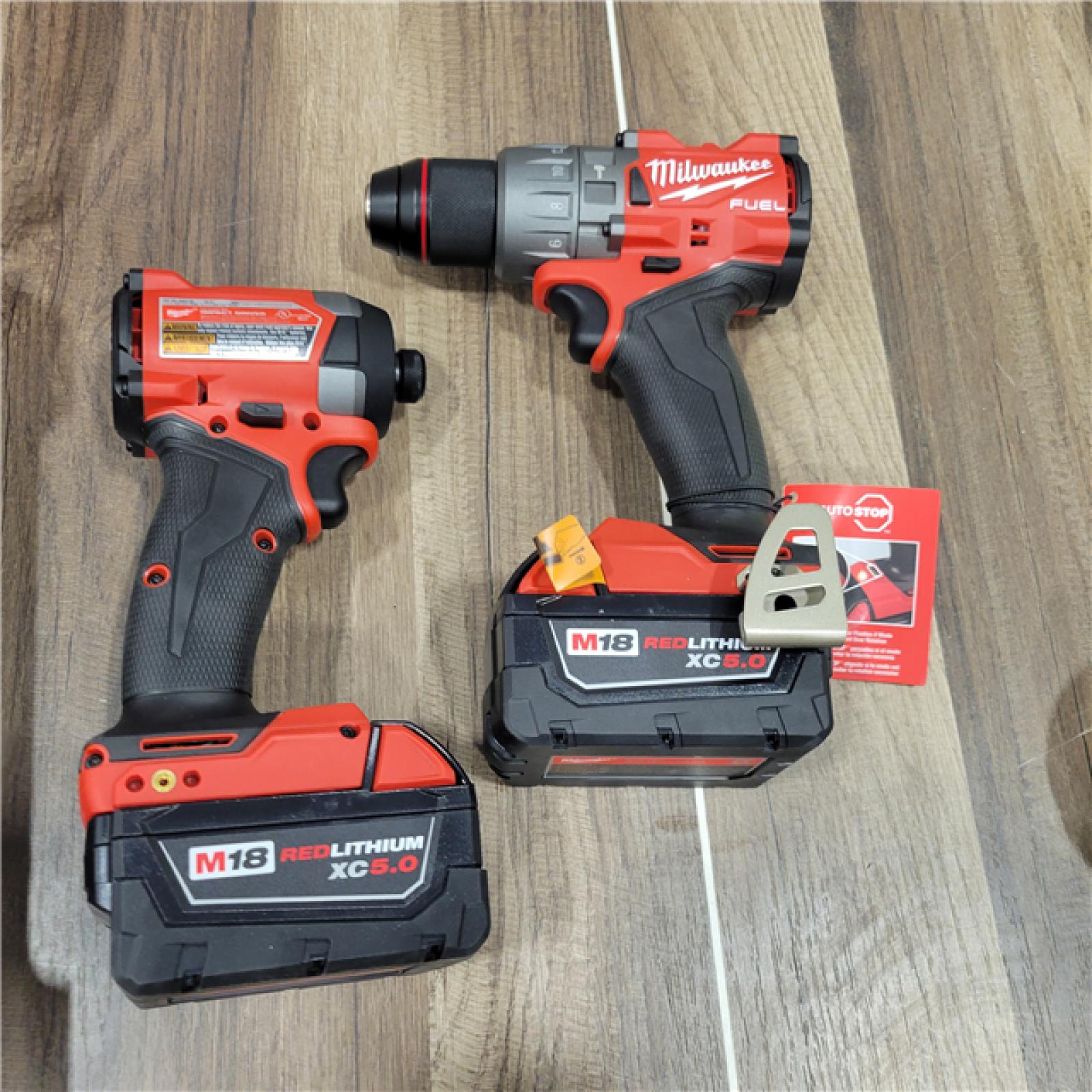 AS-IS  Milwaukee M18 FUEL 18V Lithium-Ion Brushless Cordless Hammer Drill and Impact Driver Combo Kit (2-Tool) with 2 Batteries