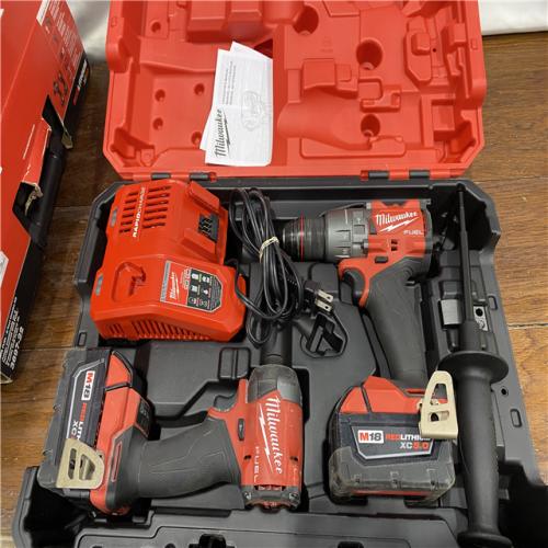 AS-IS MILWAUKEE M18 FUEL 18V Lithium-Ion Brushless Cordless Hammer Drill and Impact Driver Combo Kit (2-Tool) with 2 Batteries
