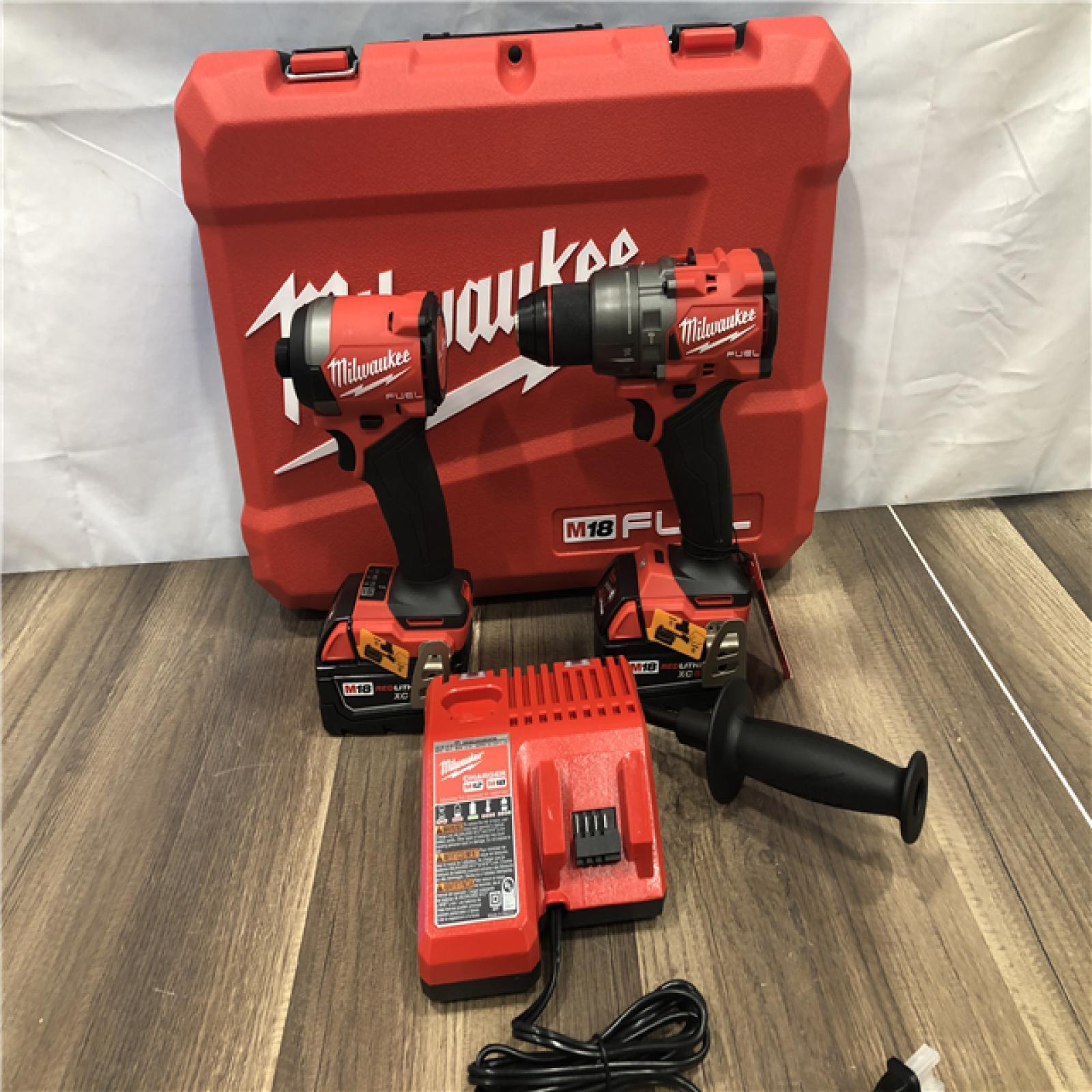 AS-IS Milwaukee FUEL 18V Lithium-Ion Brushless Cordless Hammer Drill and Impact Driver Combo Kit