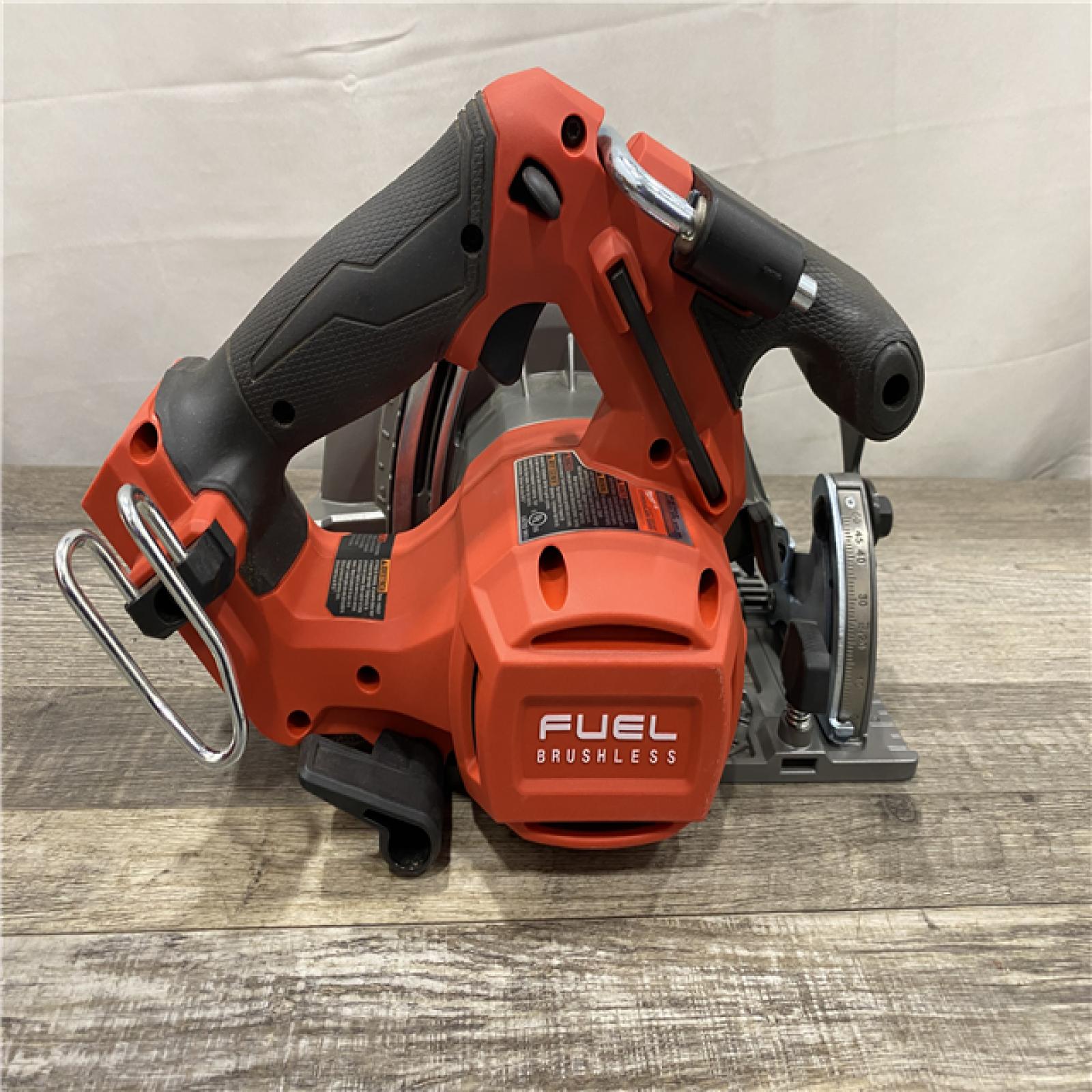 AS-IS Milwaukee FUEL 18V Lithium-Ion Brushless Cordless 6-1/2 in. Circular Saw (Tool-Only)