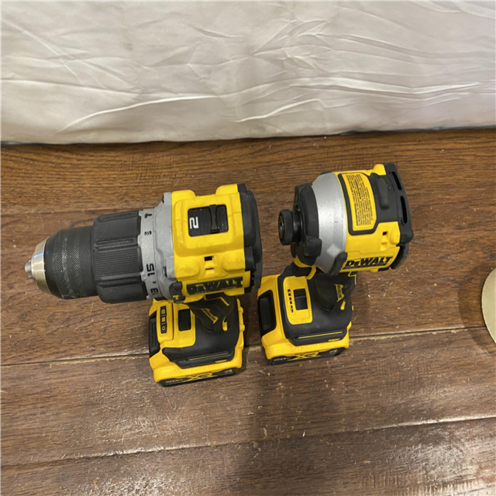 AS-IS DEWALT 20V MAX XR Hammer Drill and ATOMIC Impact Driver 2 Tool Cordless Combo Kit with (2) 4.0Ah Batteries, Charger, and Bag