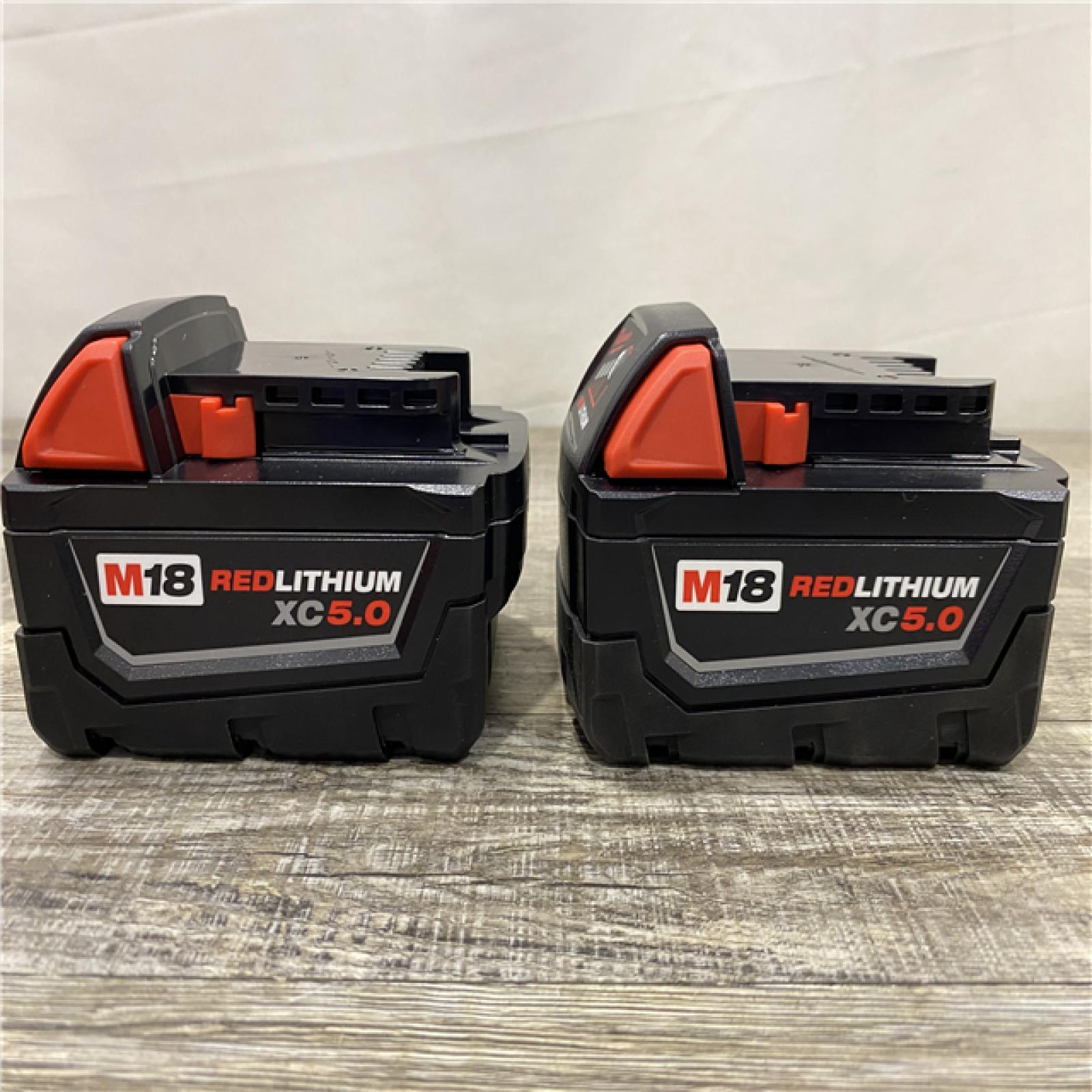 AS-IS Milwaukee 18-Volt Lithium-Ion XC Starter Kit with Two 5.0Ah Batteries and Charger