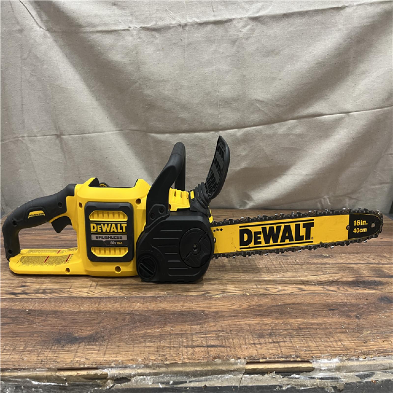 AS-IS DEWALT  FLEXVOLT 60V MAX 16in. Brushless Cordless Battery Powered Chainsaw Kit with (1) FLEXVOLT 2 Ah Battery & Charger