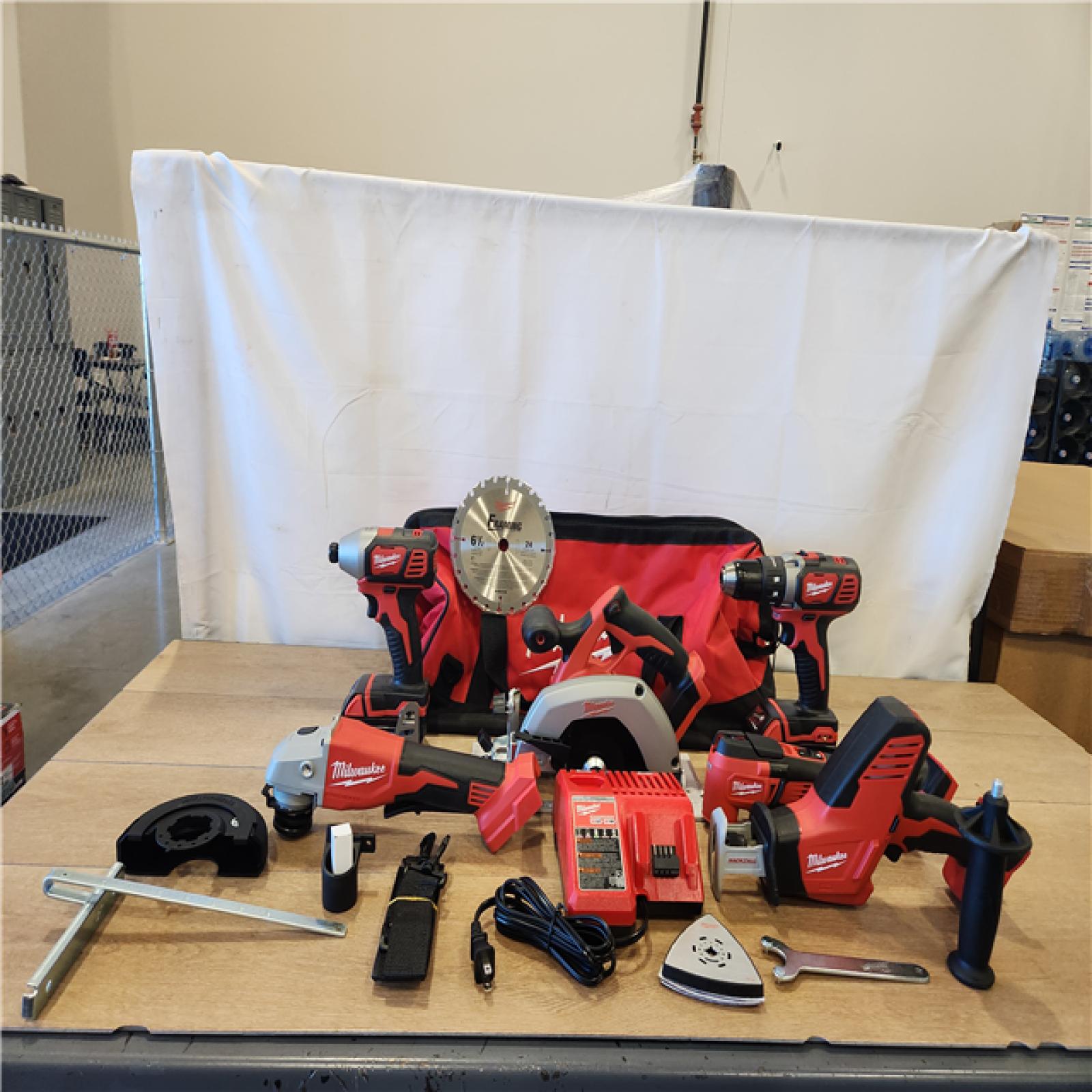 AS-IS- M18 18-Volt Lithium-Ion Cordless Combo Kit 7-Tool with 2-Batteries  Charger and Tool Bag