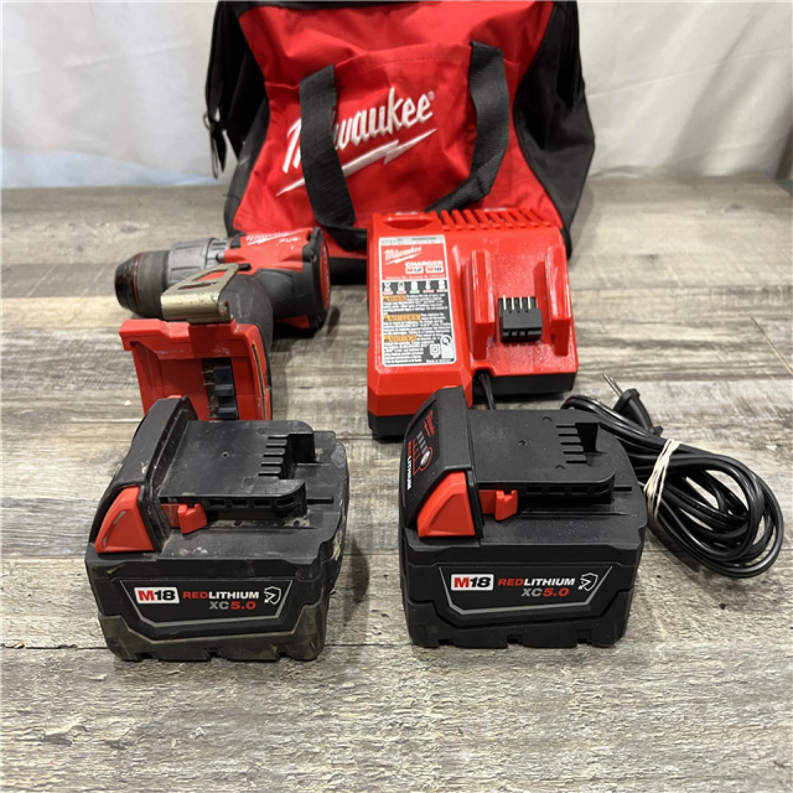 AS-IS Milwaukee Fuel 18-Volt Lithium-Ion Brushless Cordless 1/2 in. Hammer Drill Driver Kit