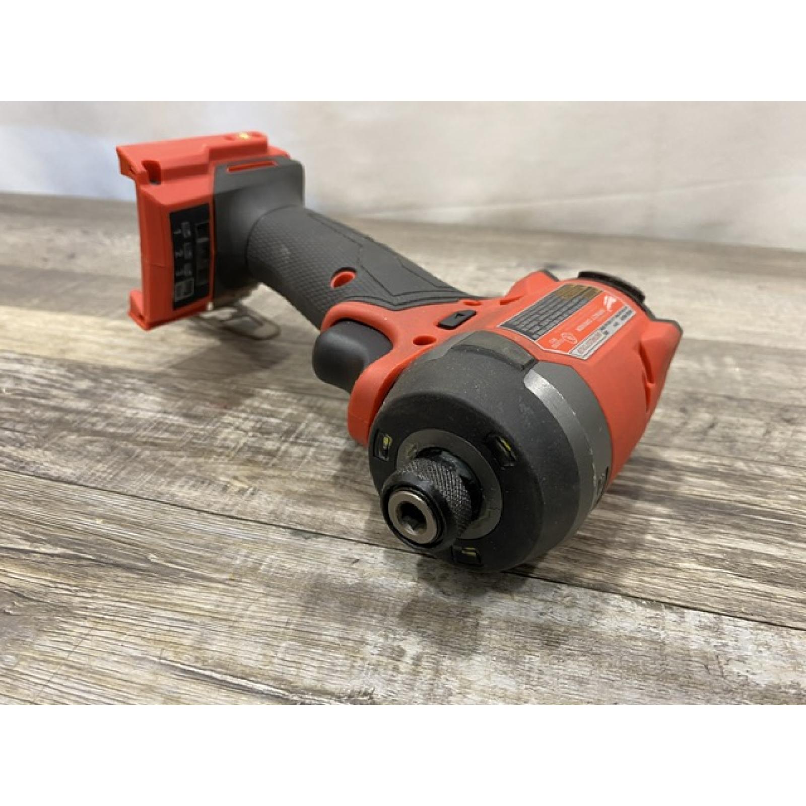 AS-IS Milwaukee FUEL 18V Lithium-Ion Brushless Cordless 1/4 in. Hex Impact Driver (Tool-Only)