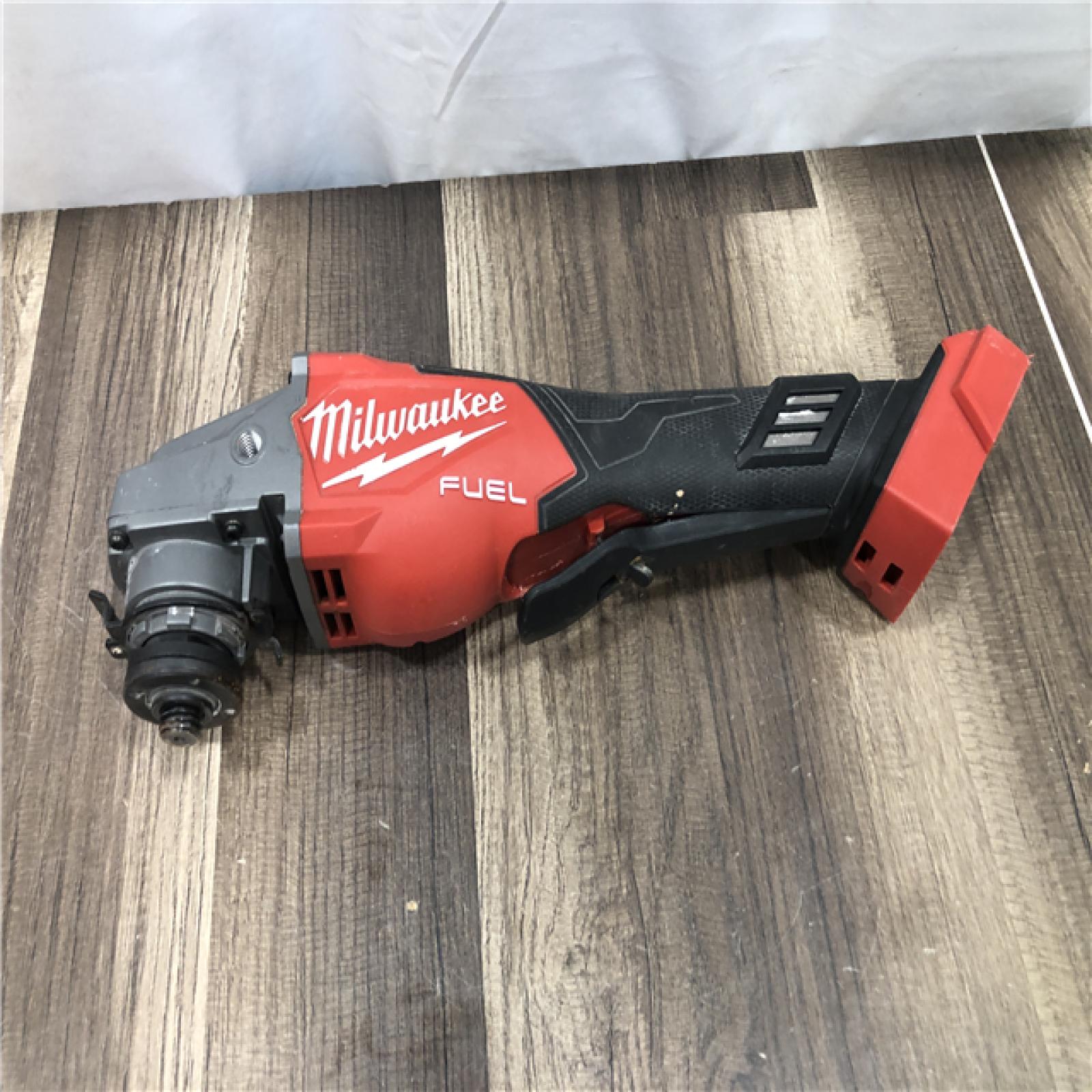 AS-IS Milwaukee  FUEL 18-Volt Lithium-Ion Brushless Cordless 4-1/2 in./6 in. Braking Grinder with Paddle Switch (Tool-Only)