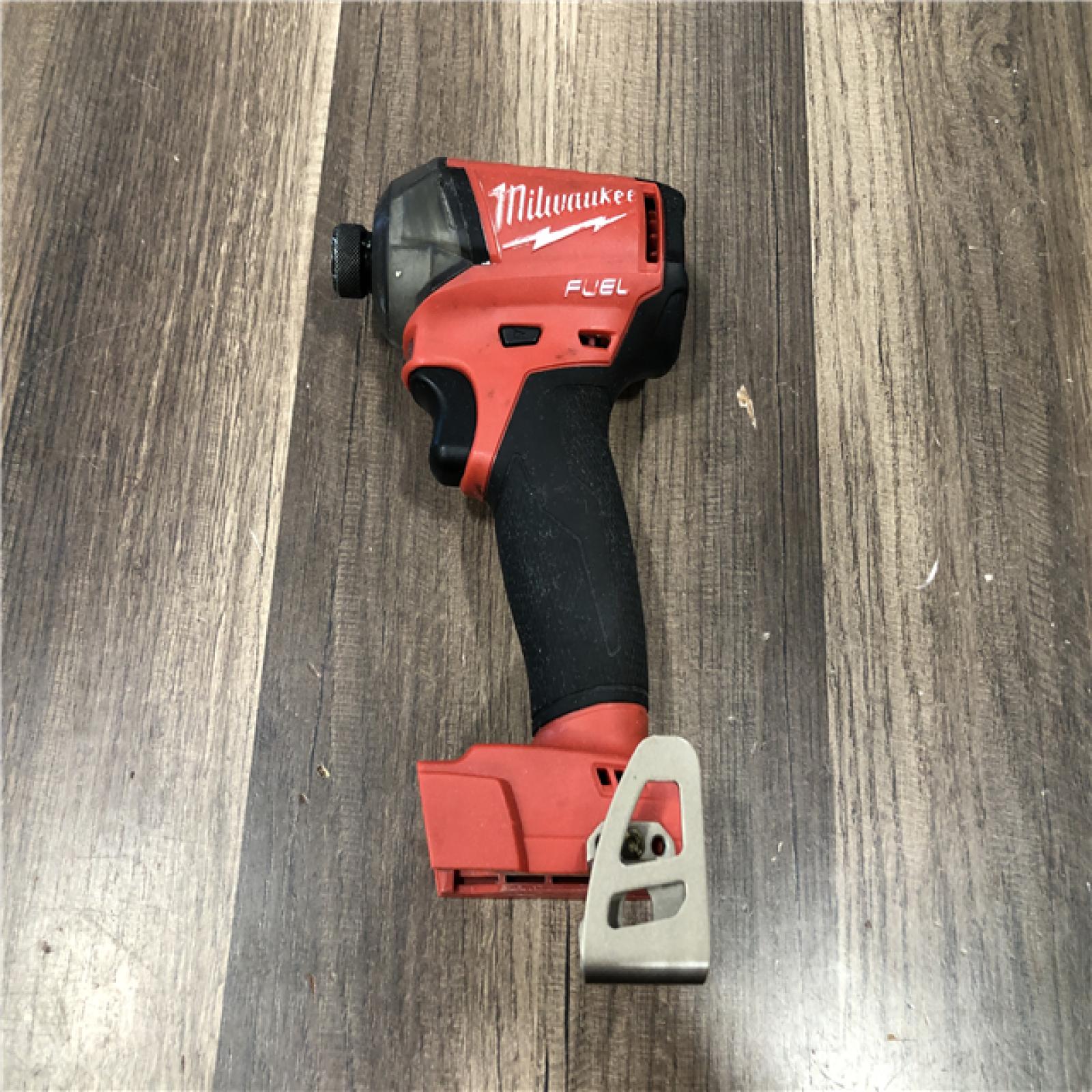AS-IS Milwaukee  FUEL SURGE 18V Lithium-Ion Brushless Cordless 1/4 in. Hex Impact Driver (Tool-Only)
