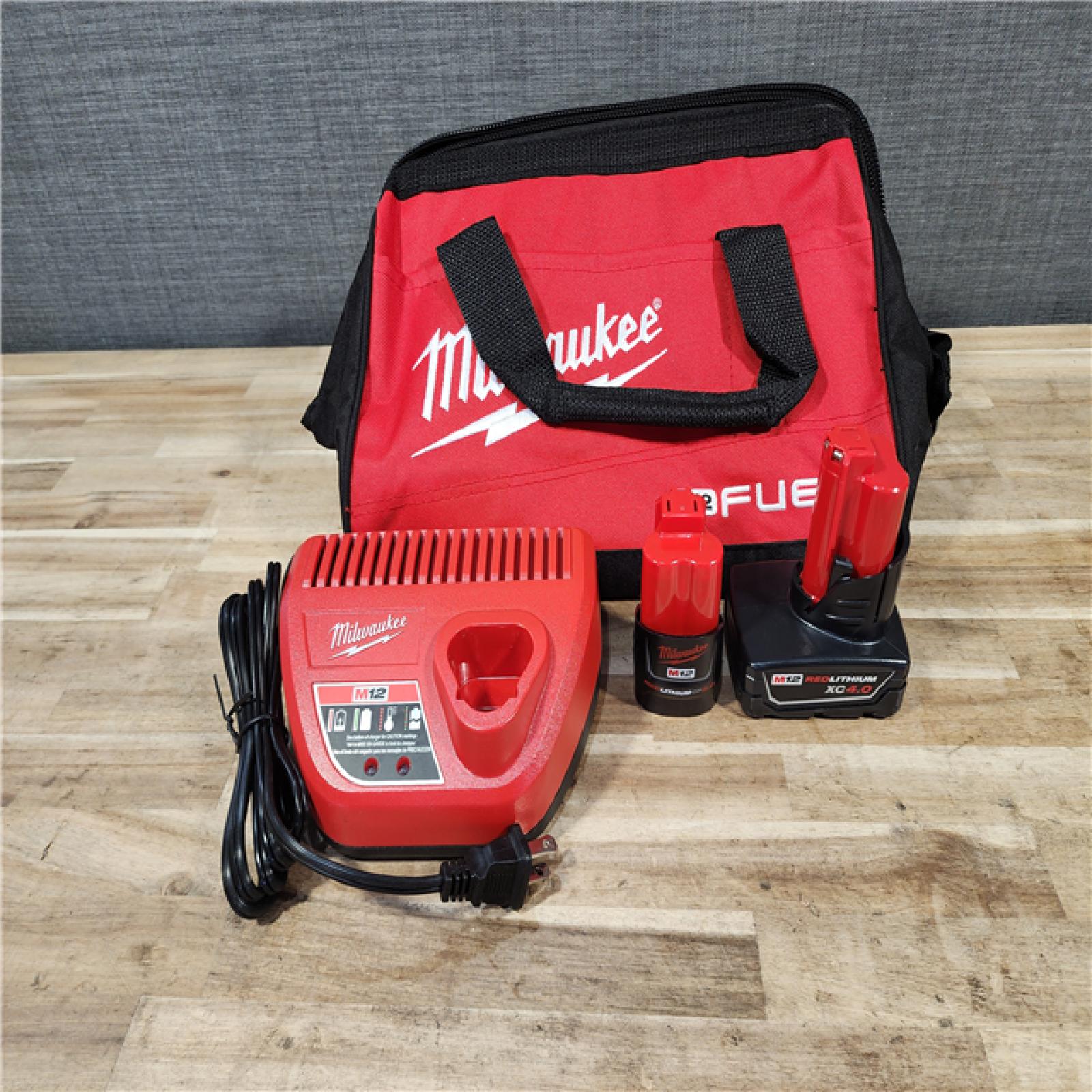 HOUSTON LOCATION - AS-IS Milwaukee  FUEL 12-Volt Lithium-Ion Brushless Cordless Hammer Drill and Impact Driver Combo Kit
