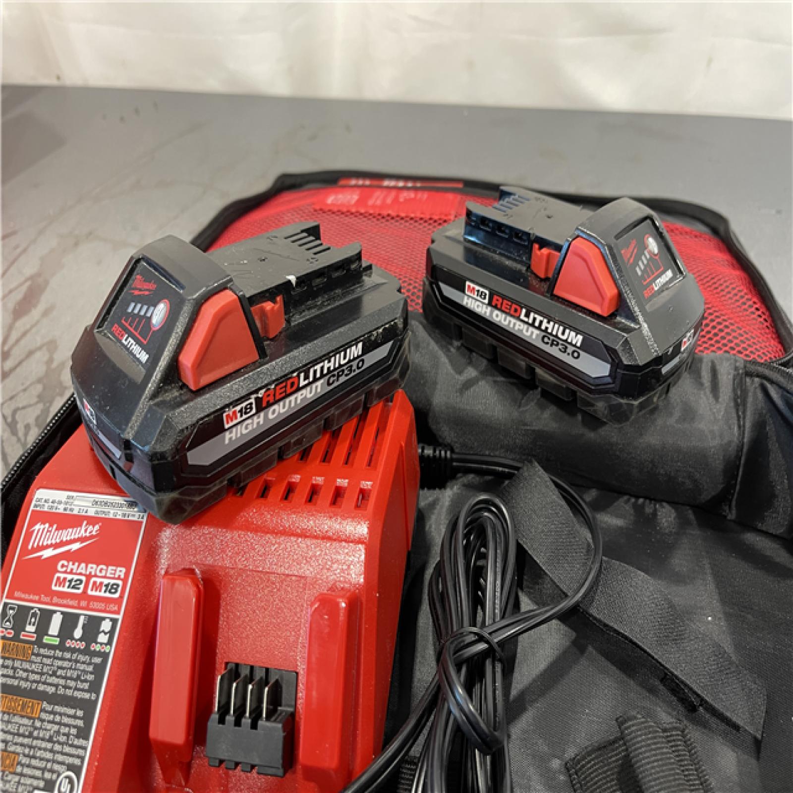 AS-IS - Milwaukee M18 18-Volt Lithium-Ion HIGH OUTPUT CP 3.0Ah Battery (2-Pack) AND M12 M18 CHARGER