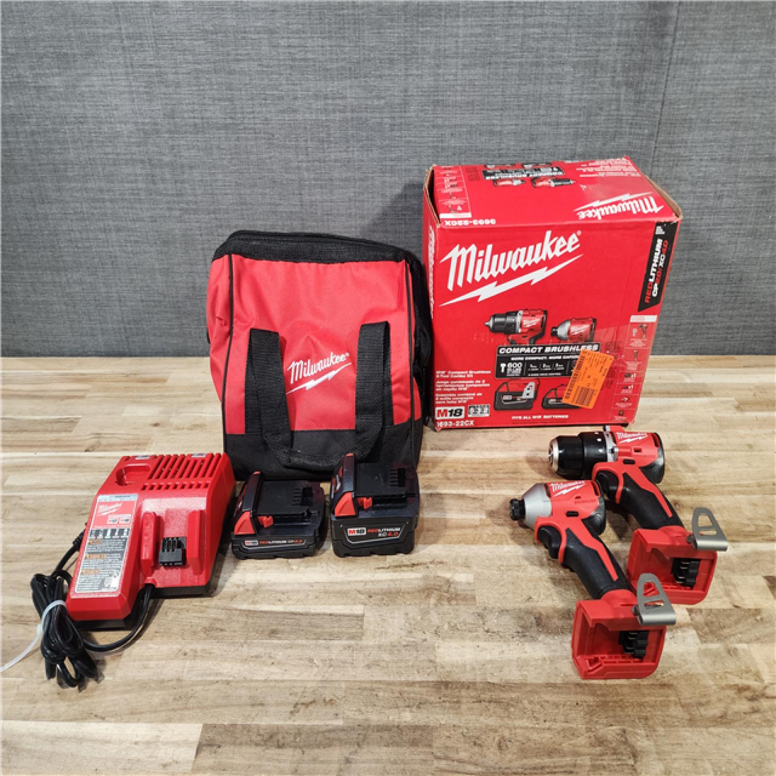 HOUSTON LOCATION - AS-IS Milwaukee 18-Volt Lithium-Ion Brushless Cordless Compact Hammer Drill/Impact Combo Kit