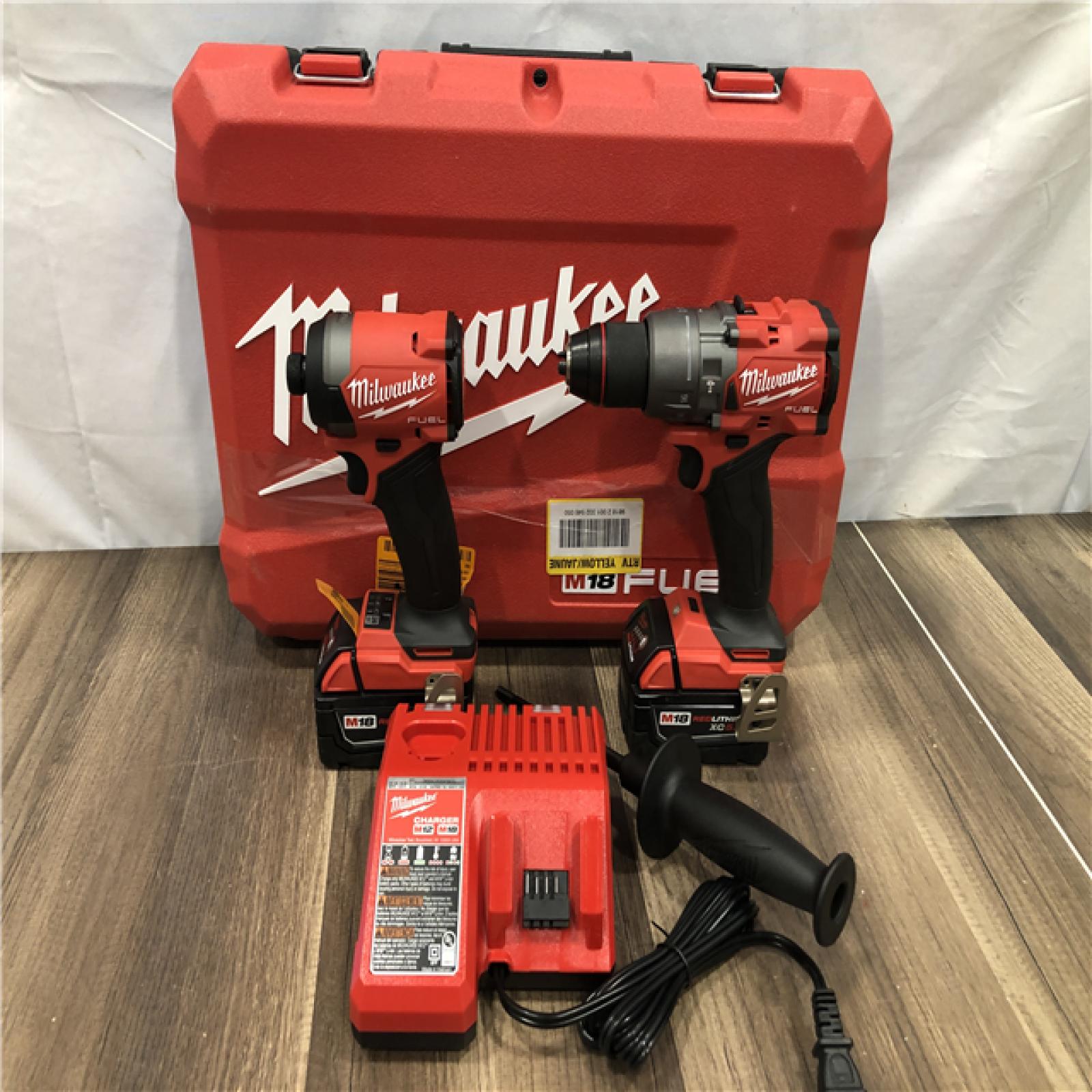 AS-IS Milwaukee  FUEL 18V Lithium-Ion Brushless Cordless Hammer Drill and Impact Driver Combo Kit