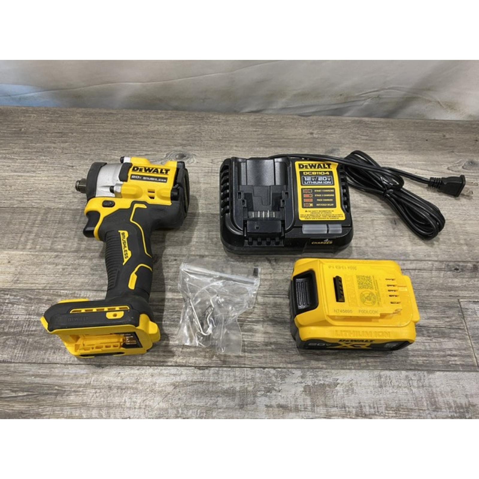 AS-IS DEWALT ATOMIC 20V MAX Lithium-Ion Brushless Cordless 1/2 in. Variable Speed Impact Wrench Kit
