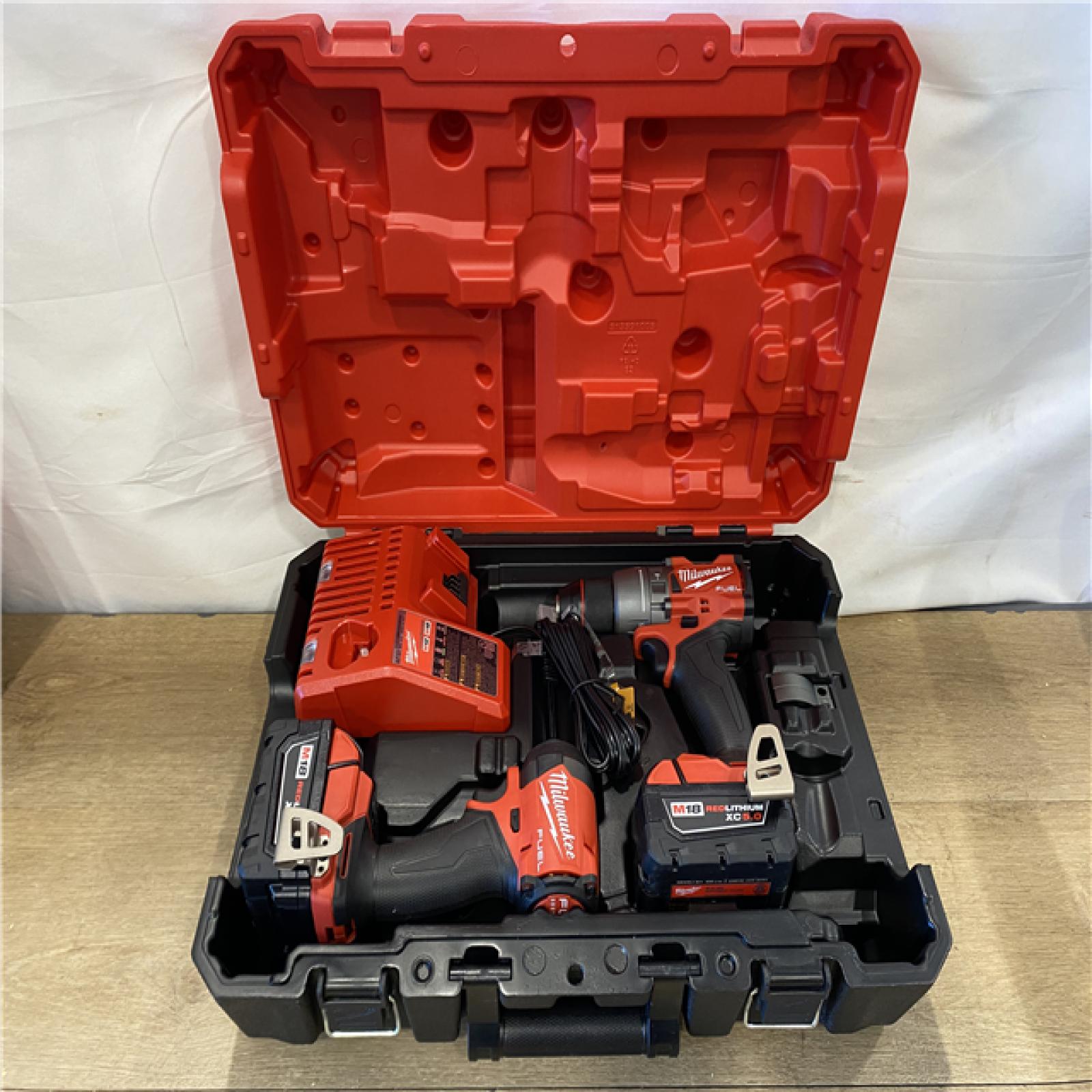AS-IS Milwaukee FUEL 18V Lithium-Ion Brushless Cordless Hammer Drill and Impact Driver Combo Kit
