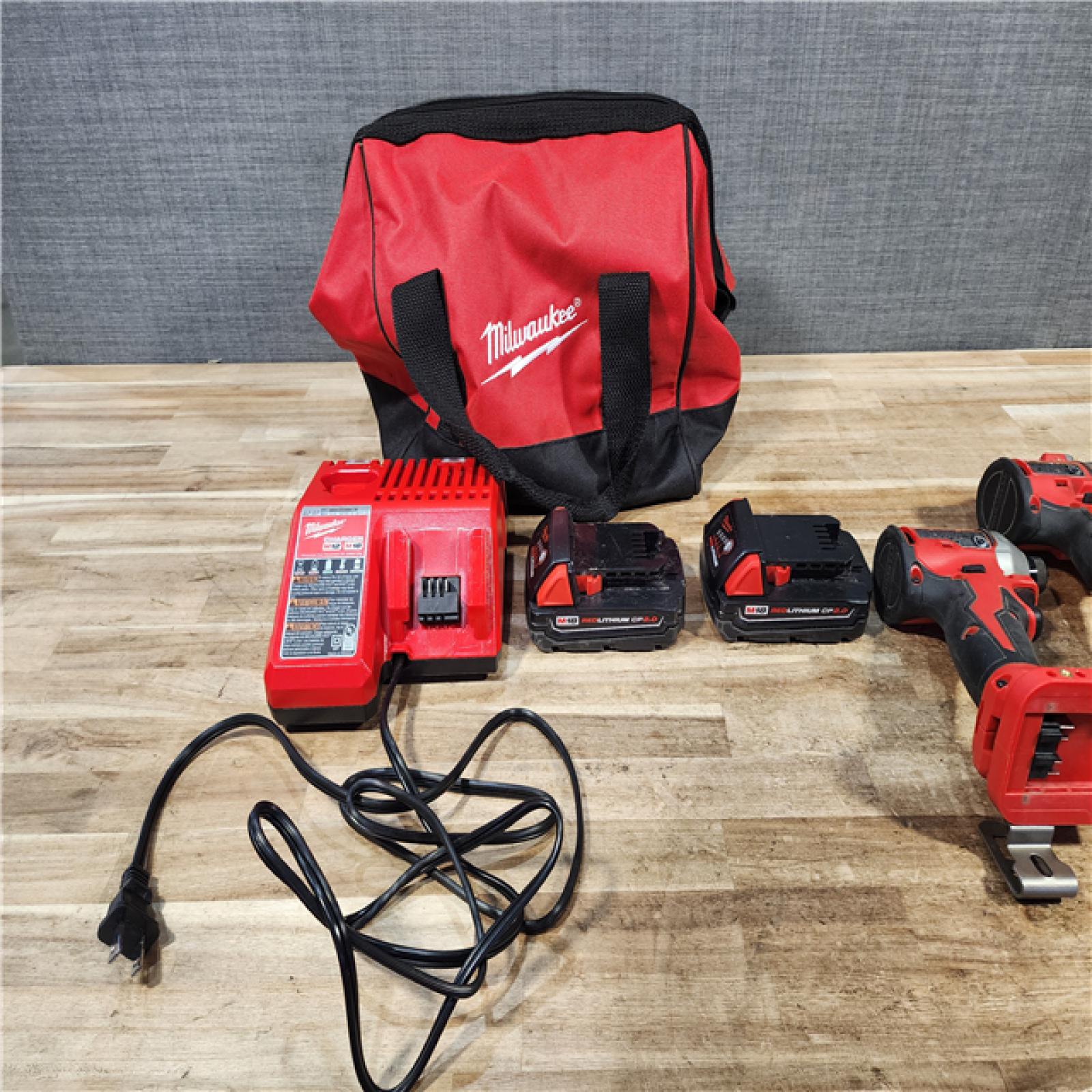 HOUSTON LOCATION - AS - IS Milwaukee 2 Tool Combo Kit W/ (2) Battery & Charger