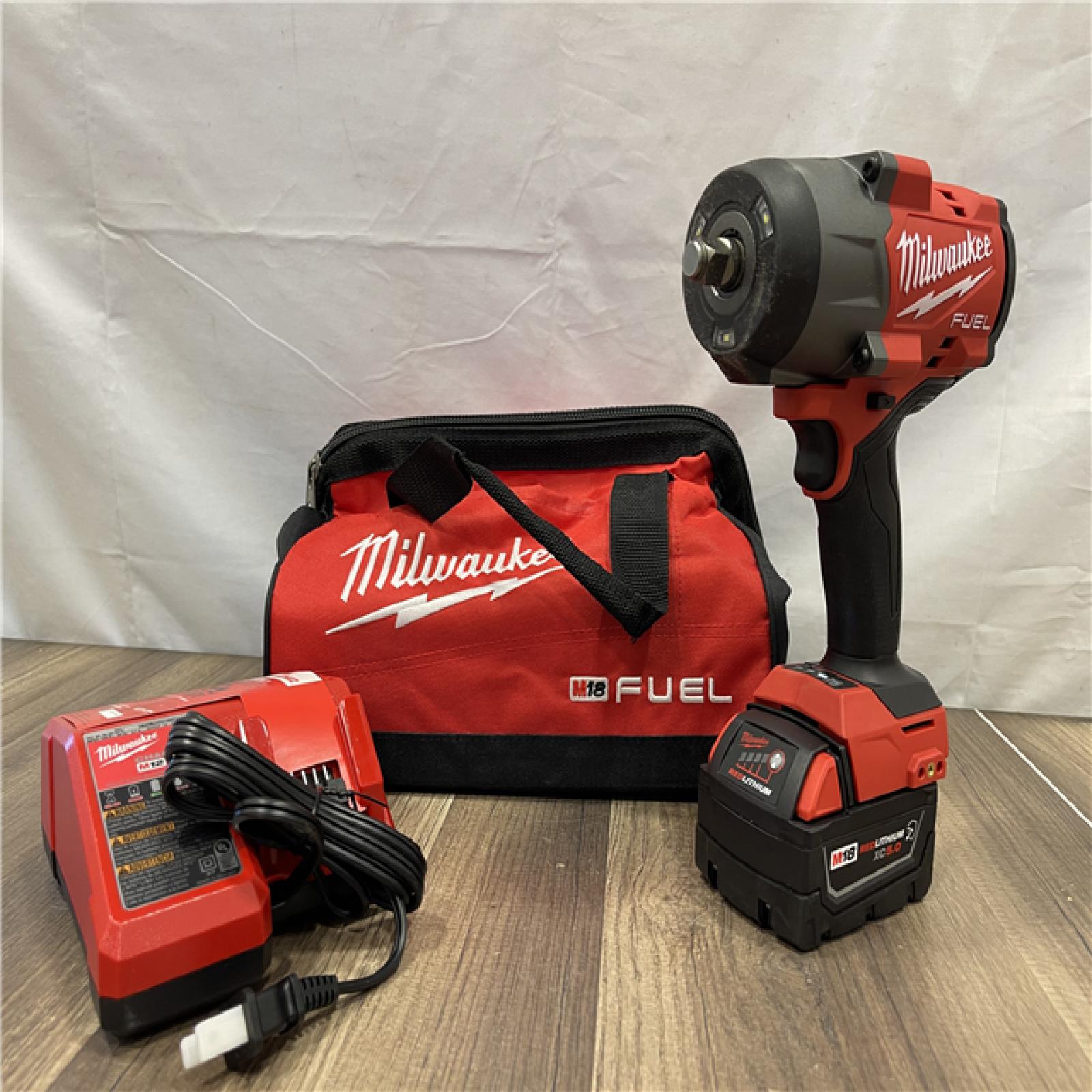 AS-IS- Milwaukee FUEL 1/2 High Torque Impact Wrench with Friction Ring Kit