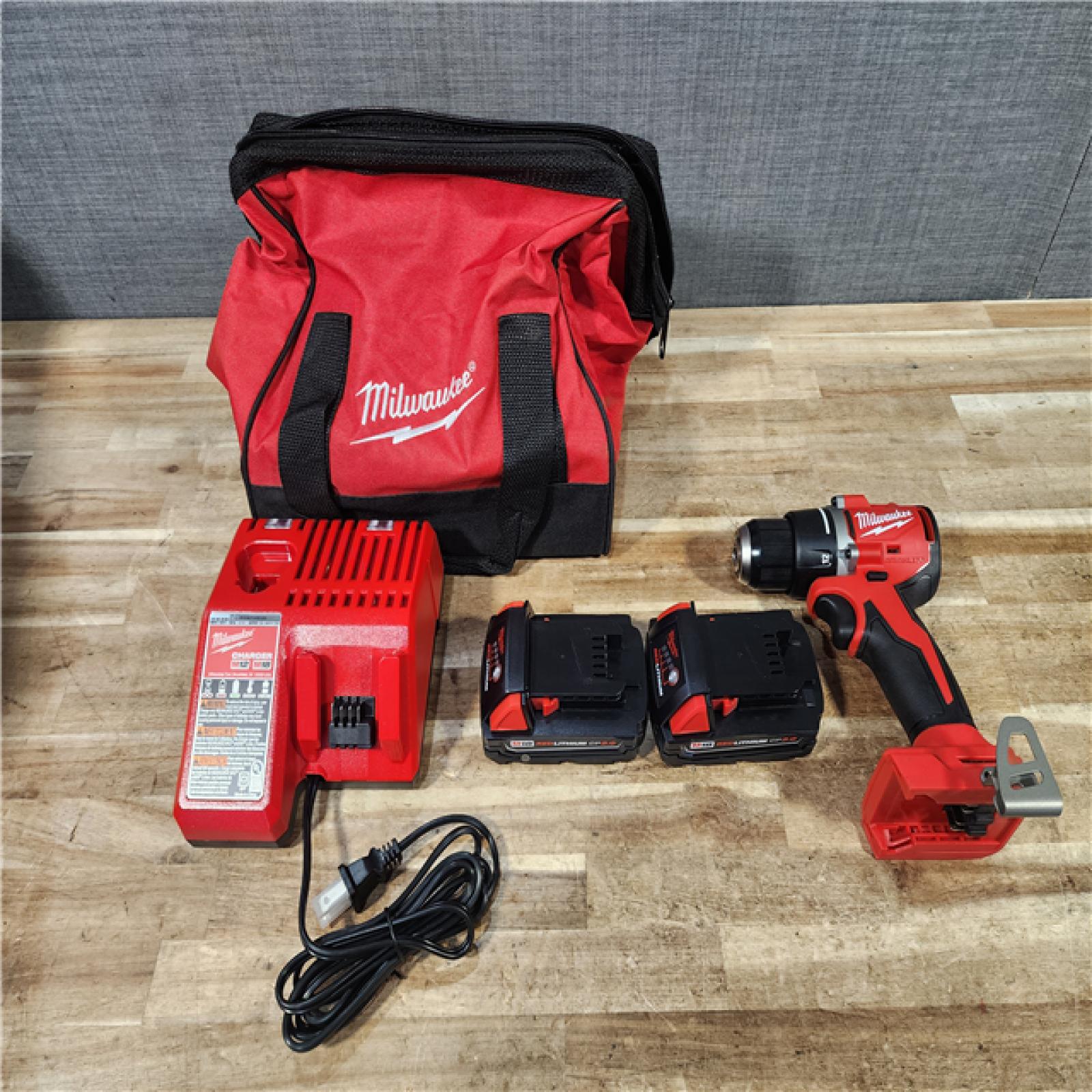 HOUSTON LOCATION - AS - IS Milwaukee 18V Lithium-Ion Brushless Cordless 1/2 in. Compact Drill/Driver Kit