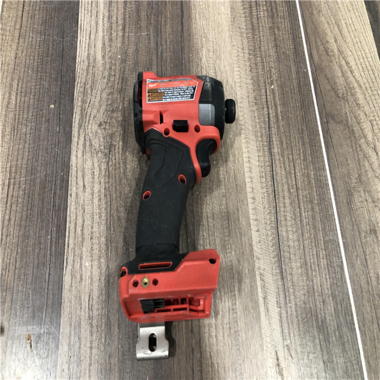 AS-IS Milwaukee  FUEL 18V Lithium-Ion Brushless Cordless 1/4 in. Hex Impact Driver (Tool-Only)